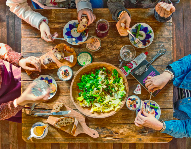 People enjoy a vegan meal.