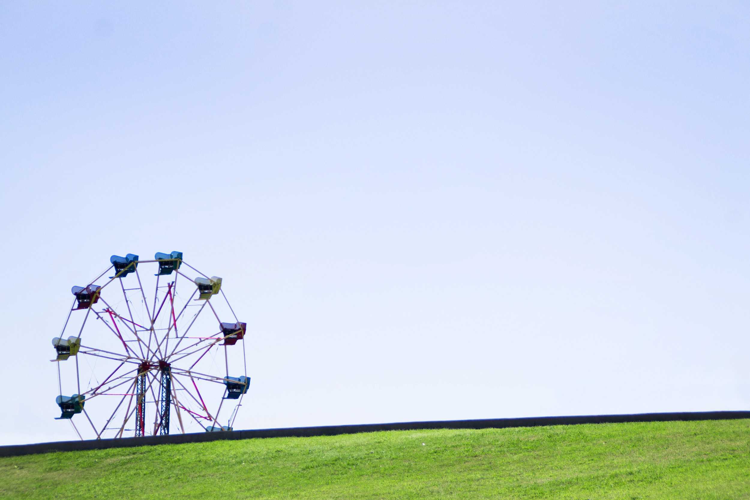  Wednesday nights at the Long Center mean Queer Ride, a bicycling meet-up for all Austinites of every kind. A ferris wheel is setup for the Queer Ride participants. 