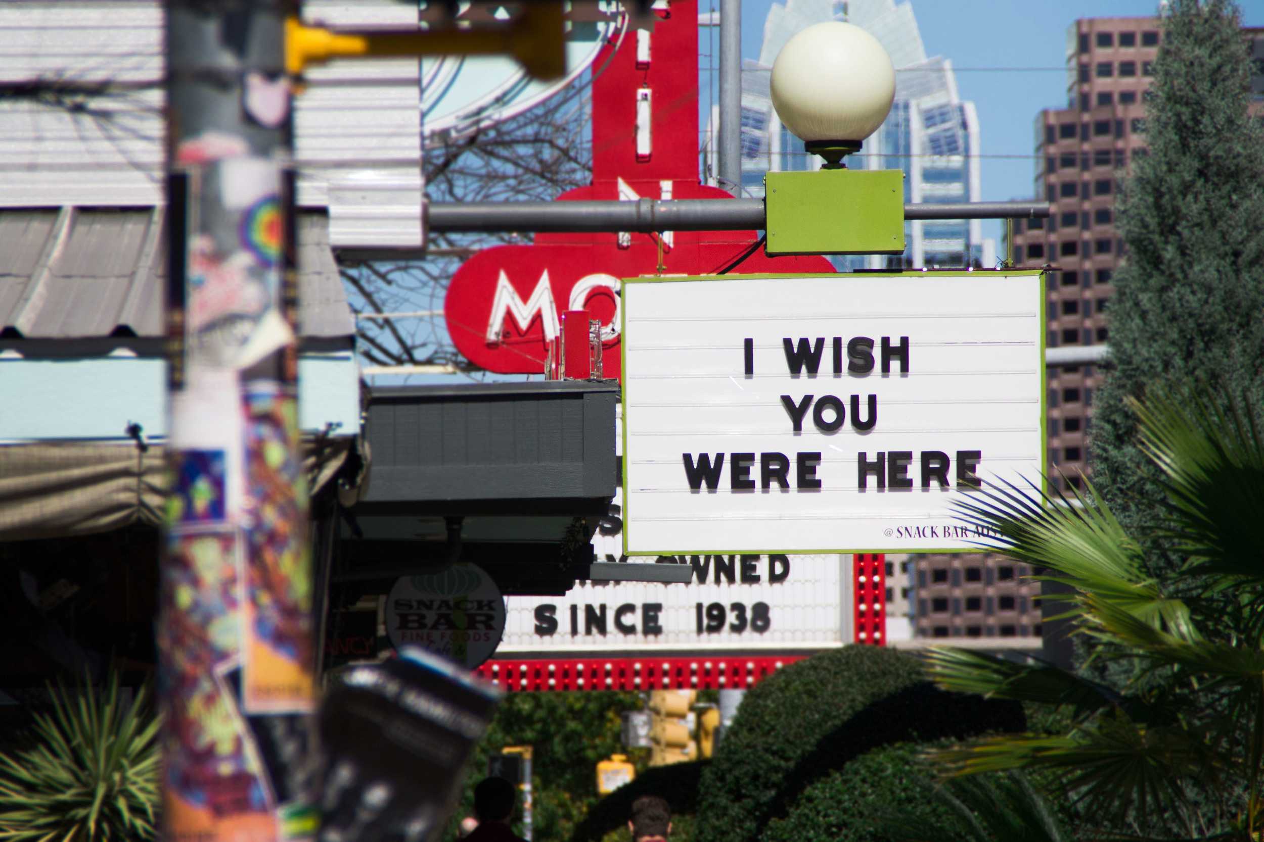  The bright colors on South Congress complement the spring fever, while a marquee at the Snack Bar alludes to the spring weather. 