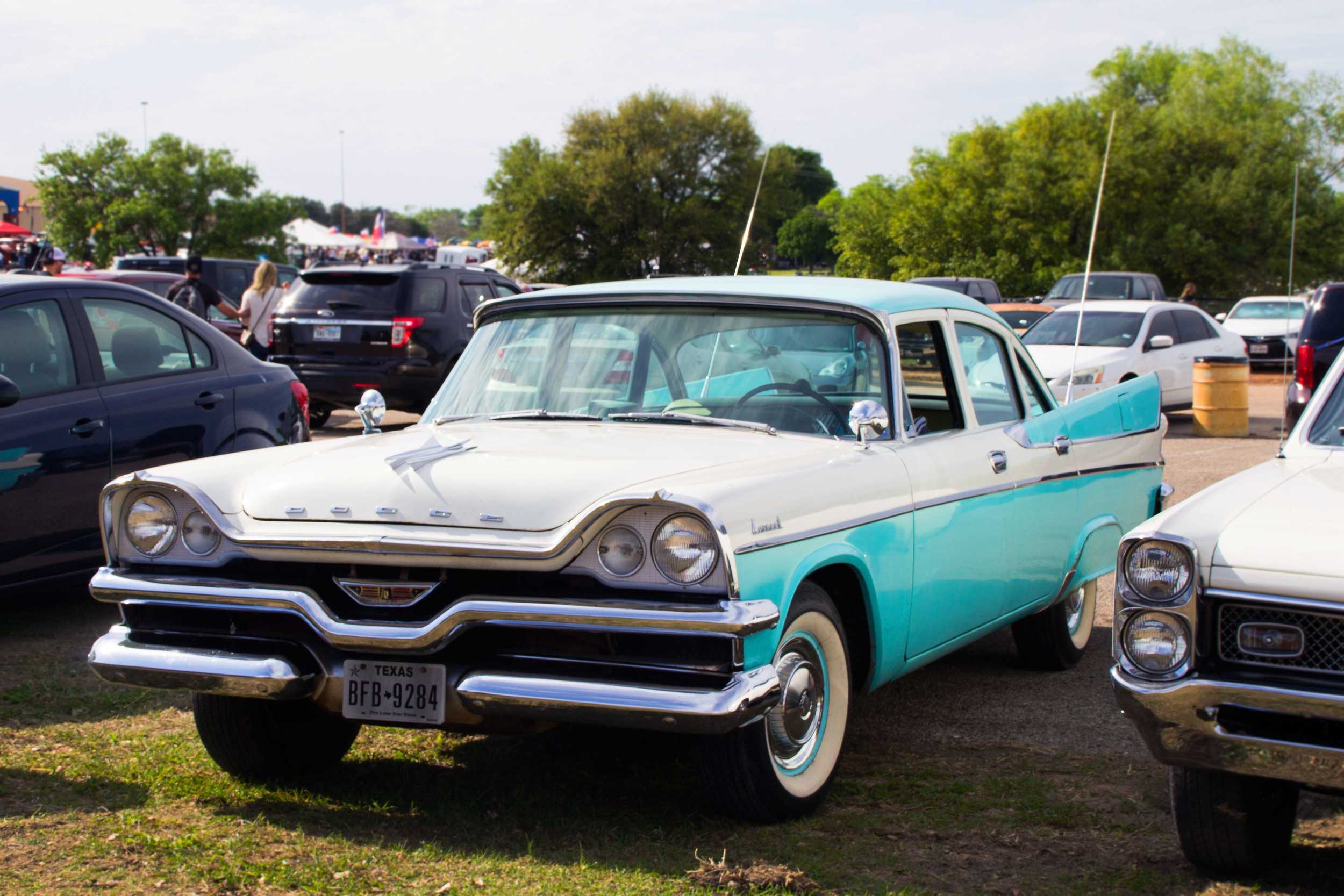  Even in the parking lot unique cars congregated.&nbsp;Although there were a lot of rare and old cars inside of the exposition, spectators drove their own unique cars as part of the fun.    