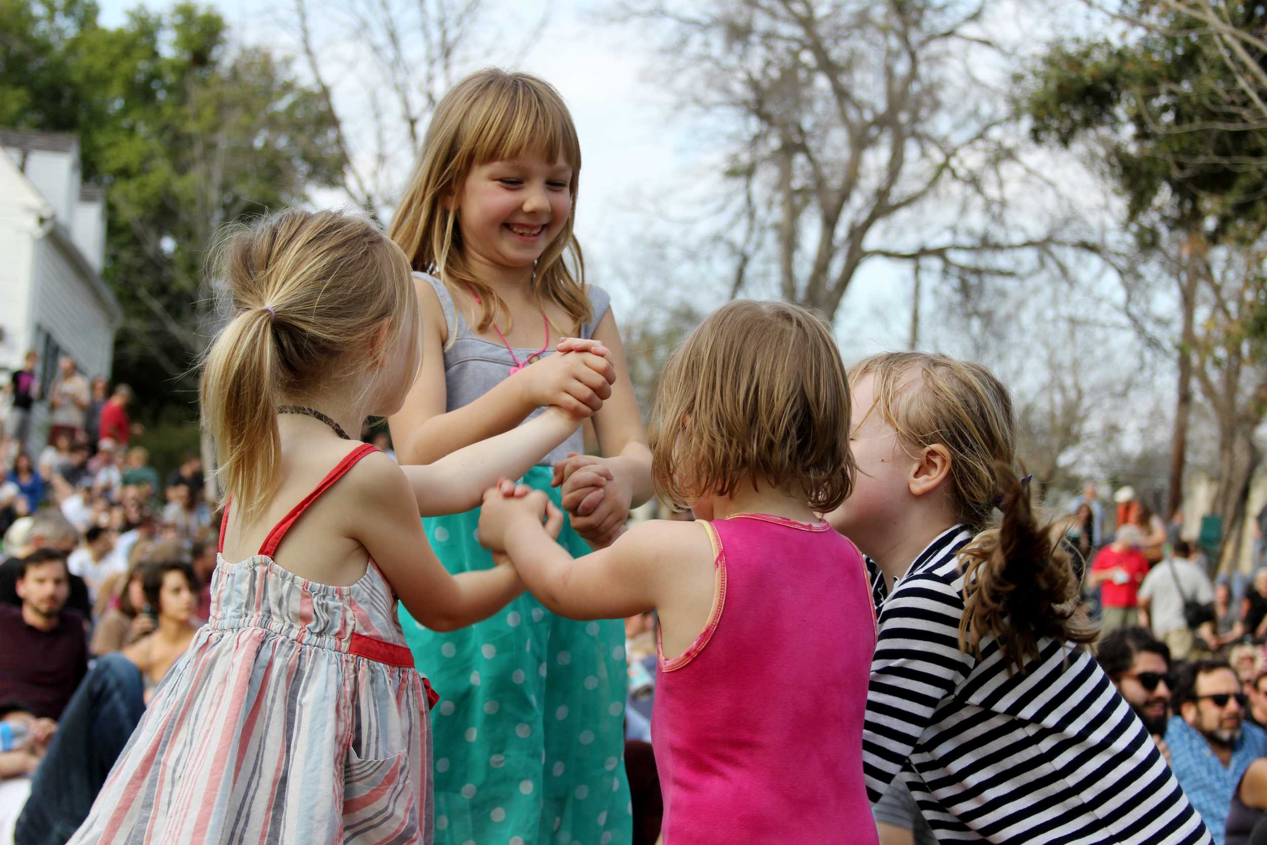  Little girls dance along to the live music at the French Legation Museum.&nbsp;   Photo by Tess Cagle  