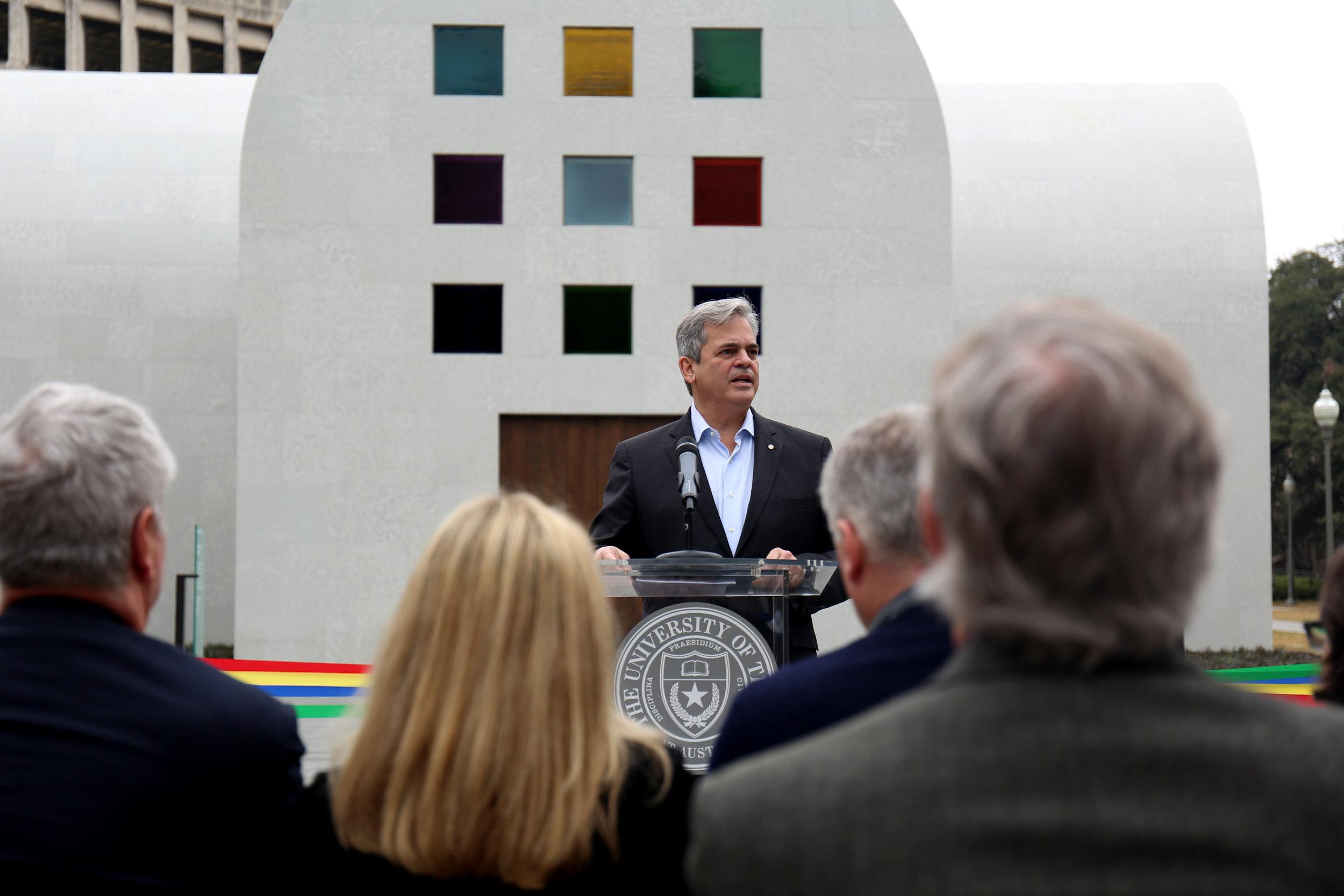   Adler welcomes the crowd to the opening.  