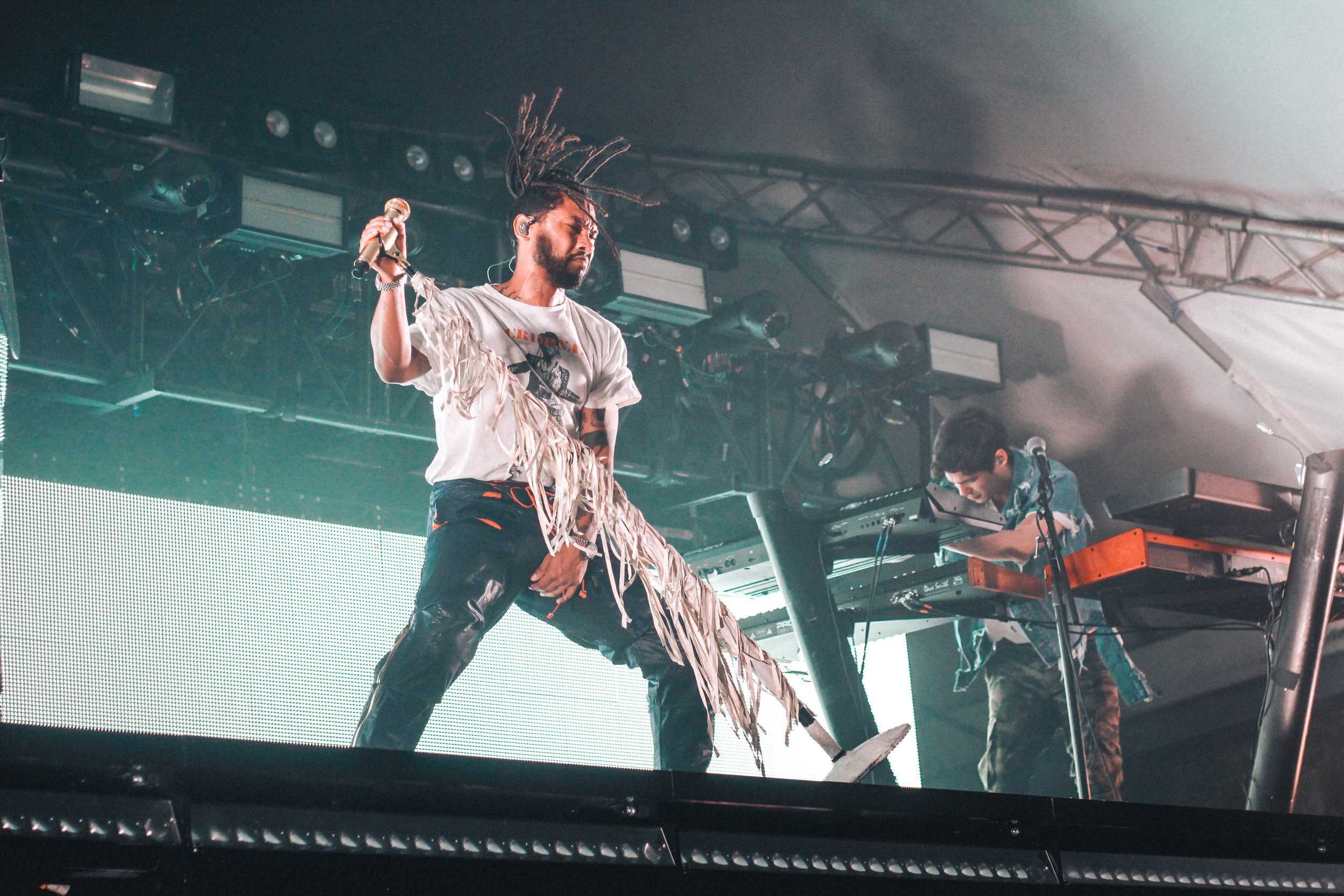   Miguel starts his show off on top of his two-story stage structure with high-energy and a full band.  