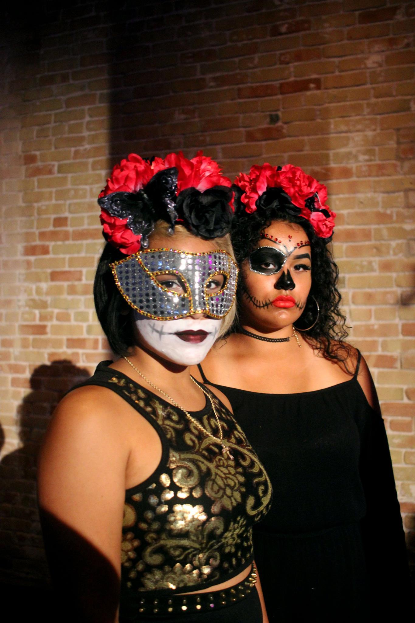   Two members from the all sister band Tiarra Girls show off their intricate face paint.   