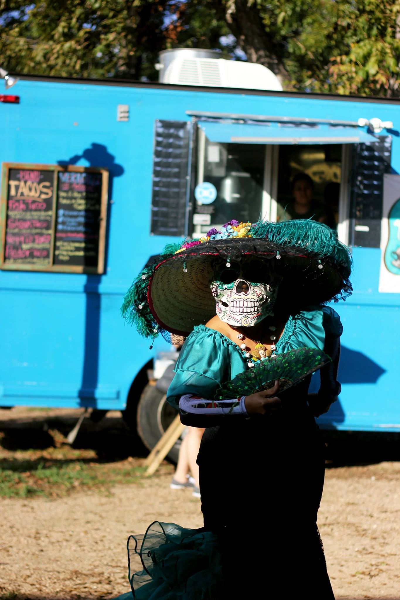   On the festival grounds different symbols and traditions pertaining to this holiday could be found, such as face paintings of the calaveras and the decorating of altars.&nbsp;The Catrina, goddess of death, is pictured above dancing.  