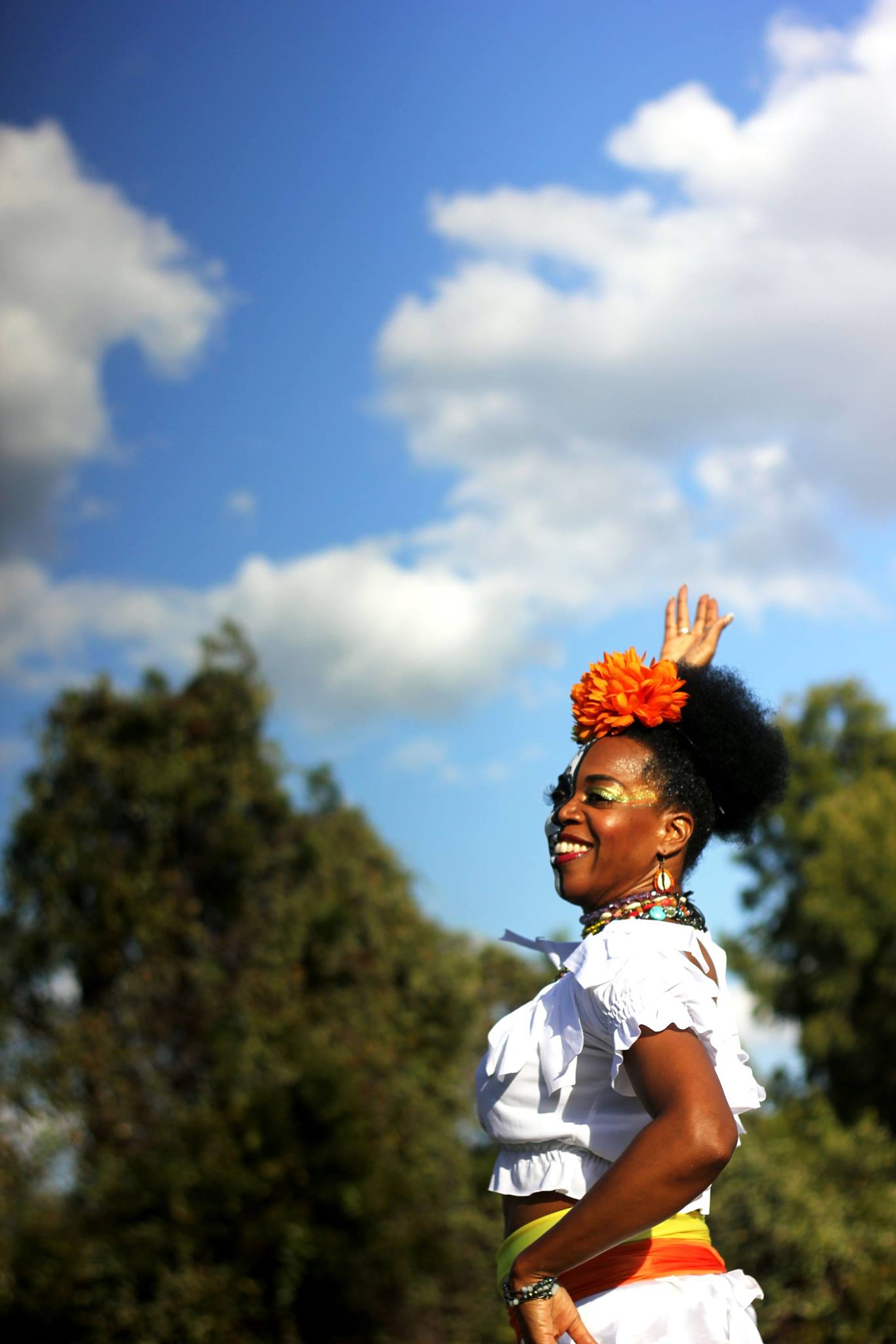   Austin’s Samba School was one of the many performances at Dia de los Muertos Music Festival. They are a Brazilian percussion and dance team. A member of the Samba team leads dancers around the festival site.   