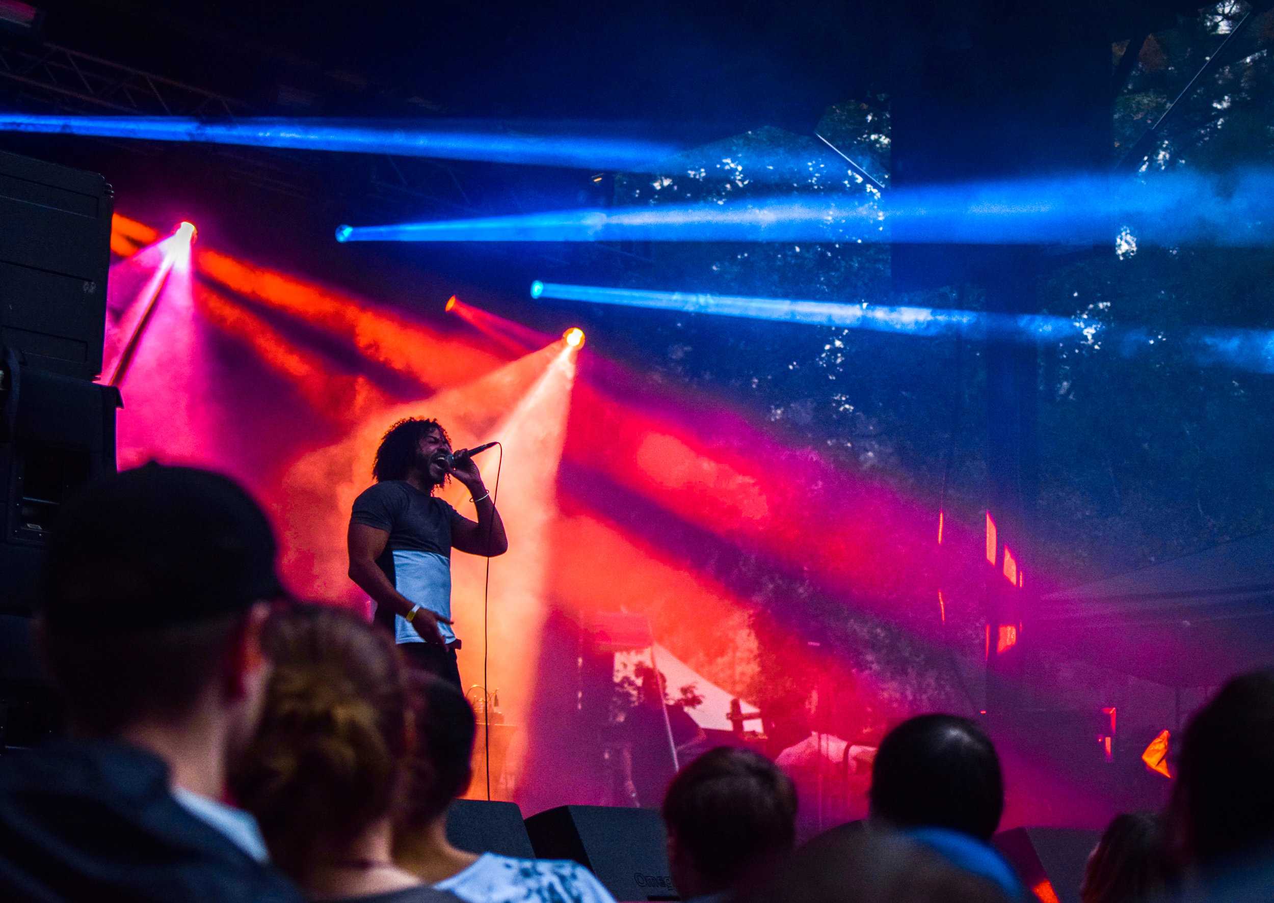   MC Daveed Diggs of Clipping raps to the crowd.  