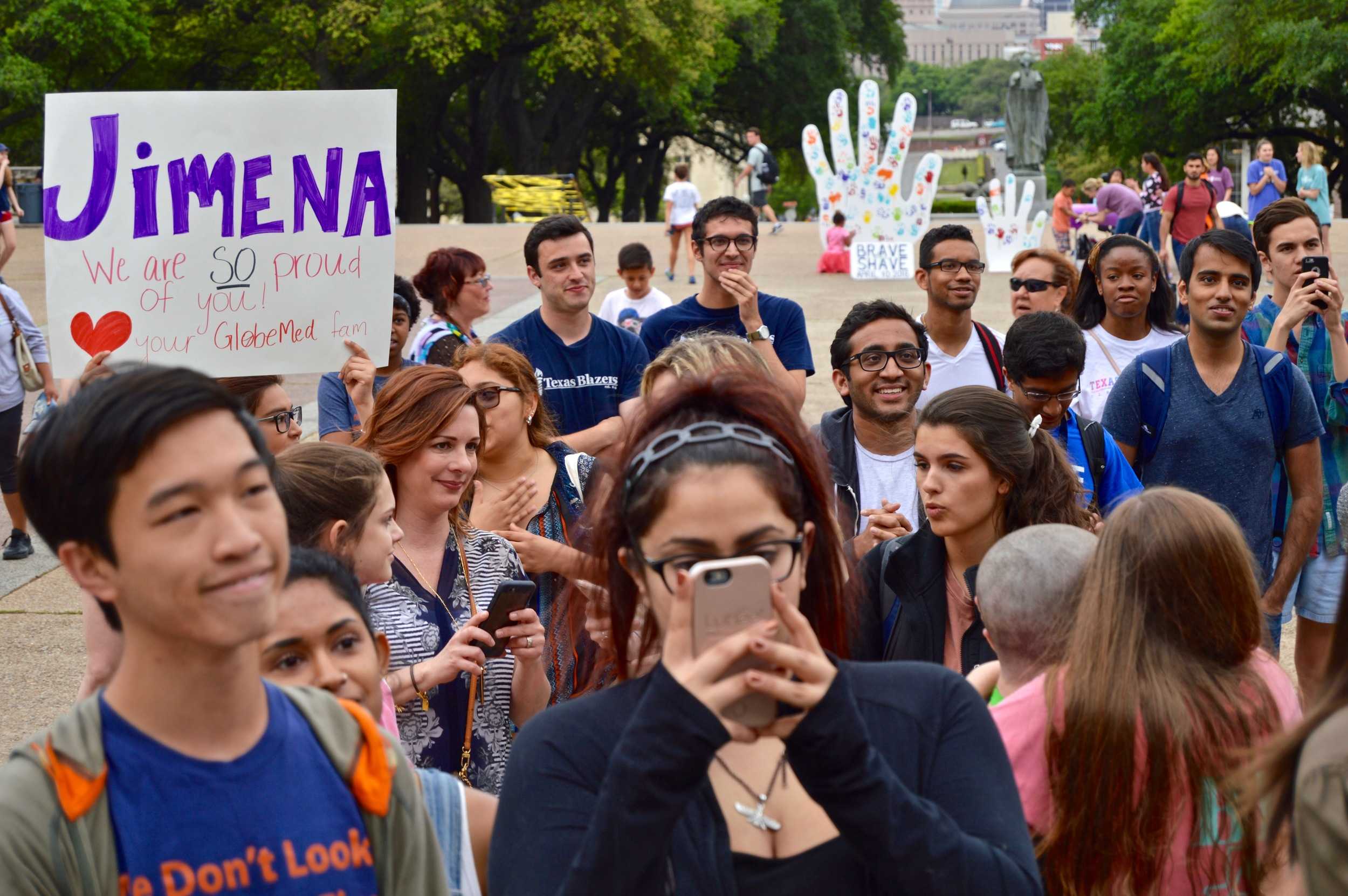   Bonilla’s family and friends made a sign in support of her decision to shave her head.&nbsp;  