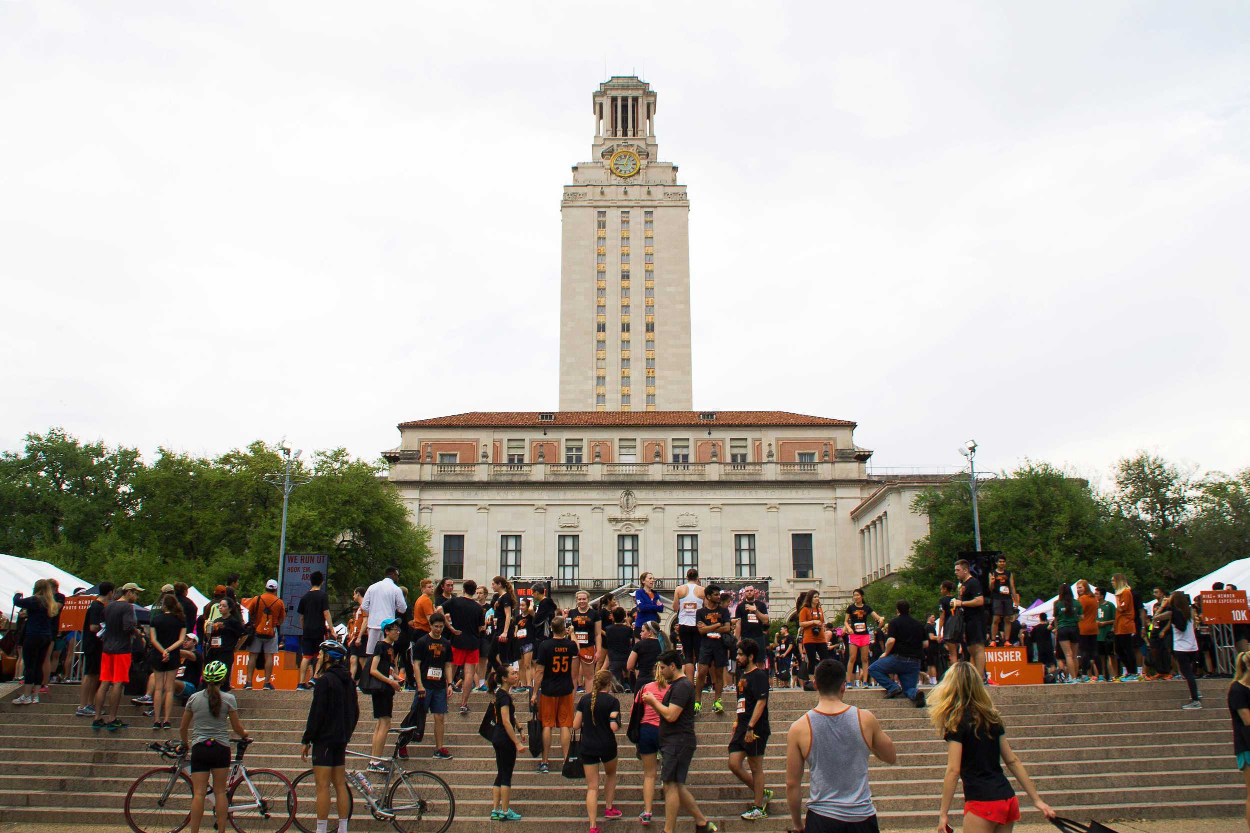  After the race, participants gather underneath the UT tower for photos, free food, and good conversation. 