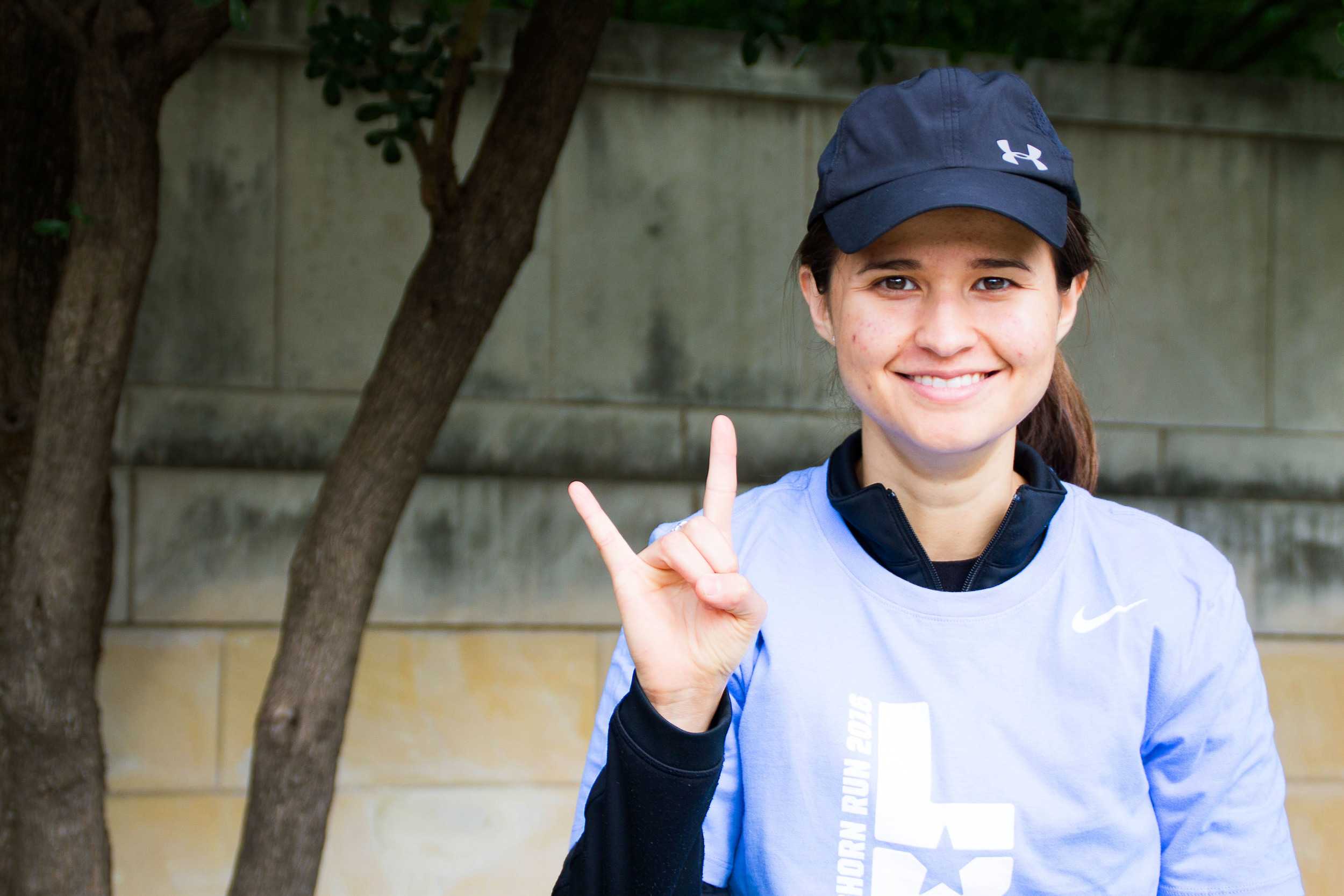  Third year computer science major Jessica Paz volunteers at the Longhorn Run for the first time. Though she’s not running in this race, she volunteers just because she likes running in general. 