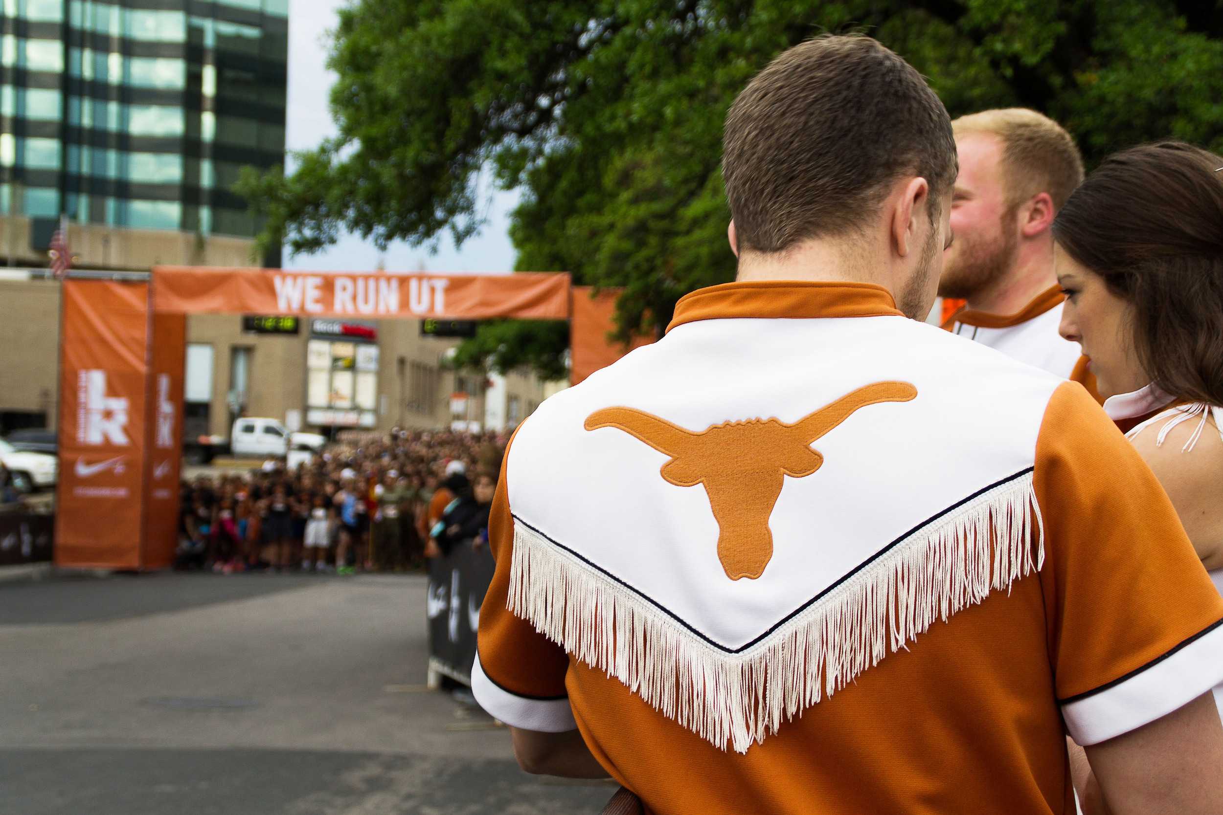  Longhorn cheerleaders support the participants and wait on the sidelines for the race to start. 