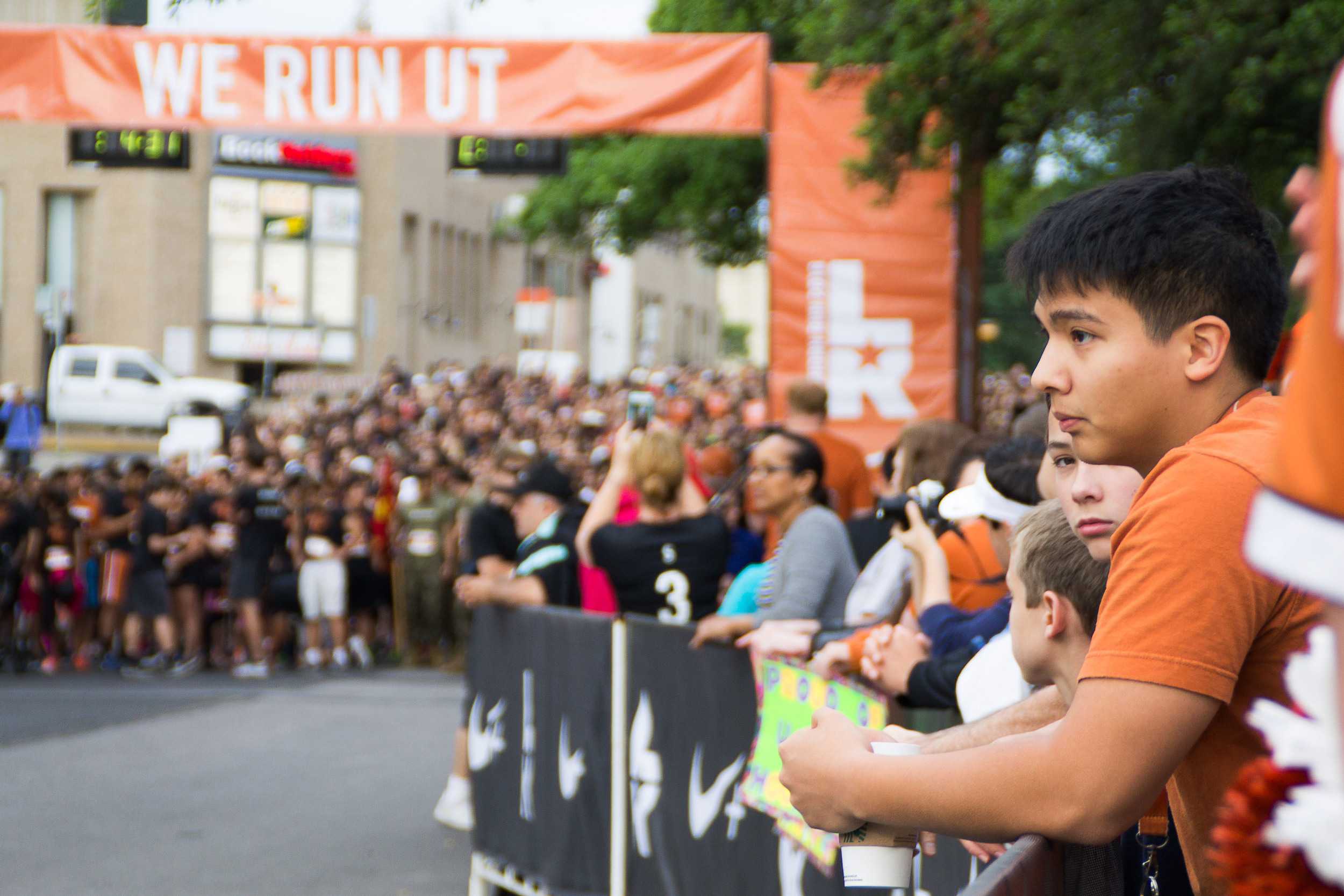  You don’t have to run to be a part of the race;&nbsp;longhorn fans expectantly wait to cheer on the racers, moments before the race begins. 