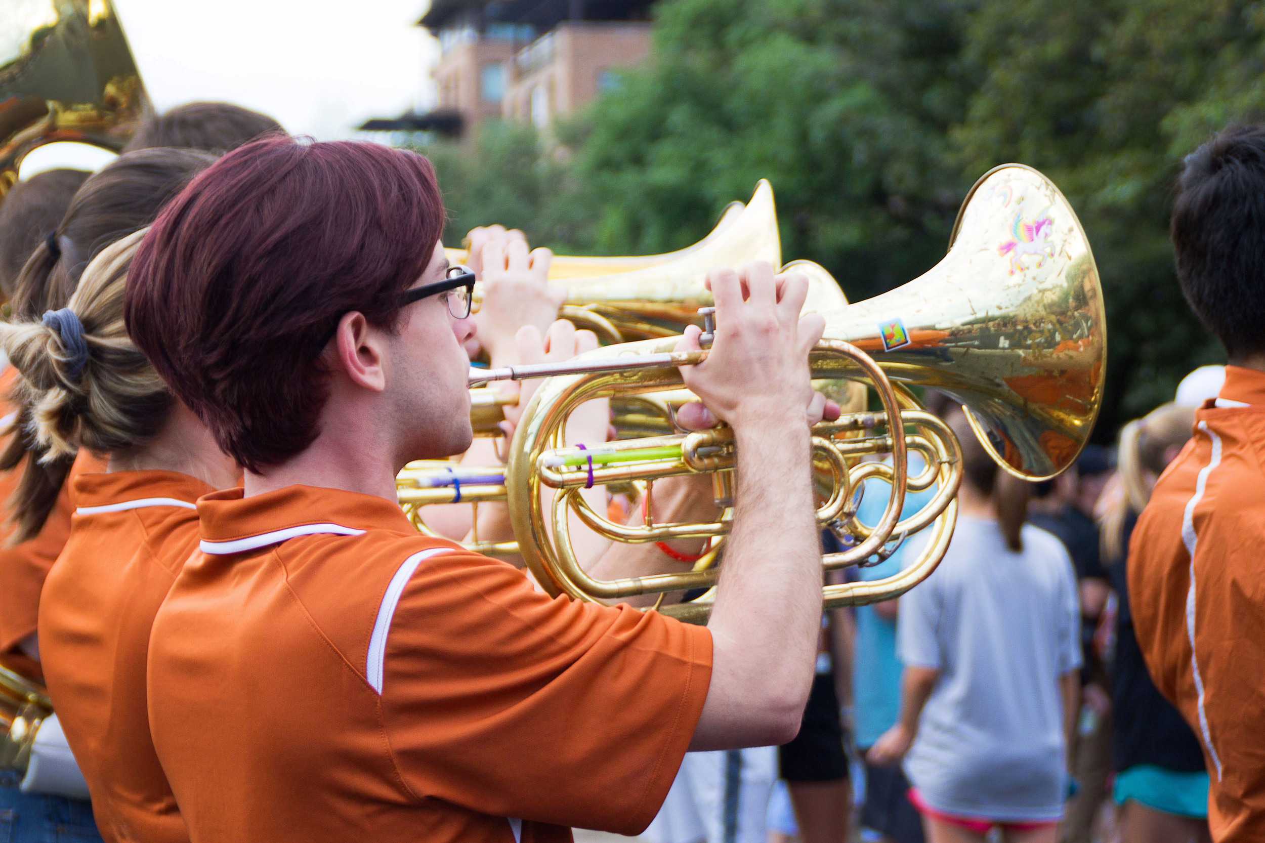  UT’s Longhorn Band plays upbeat songs at the start of the race, sending off the runners with a fanfare. 