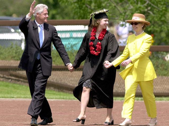   4. “Walking on Sunshine”       Accompanied by her daughter, Chelsea, and her husband, Bill, Hillary glows like the bright sun above.     