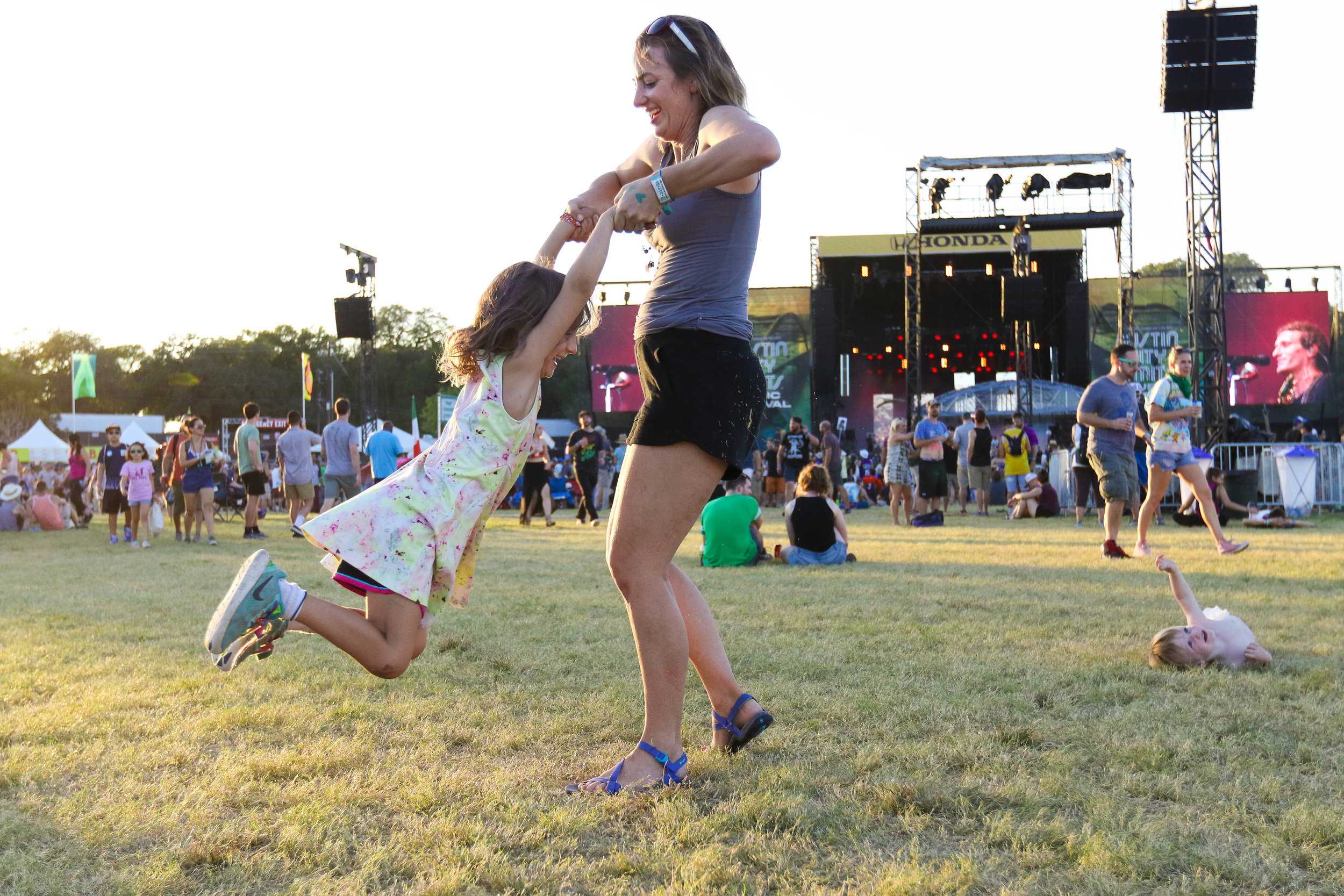   Mother and daughter share in a fun moment together at the fest.  