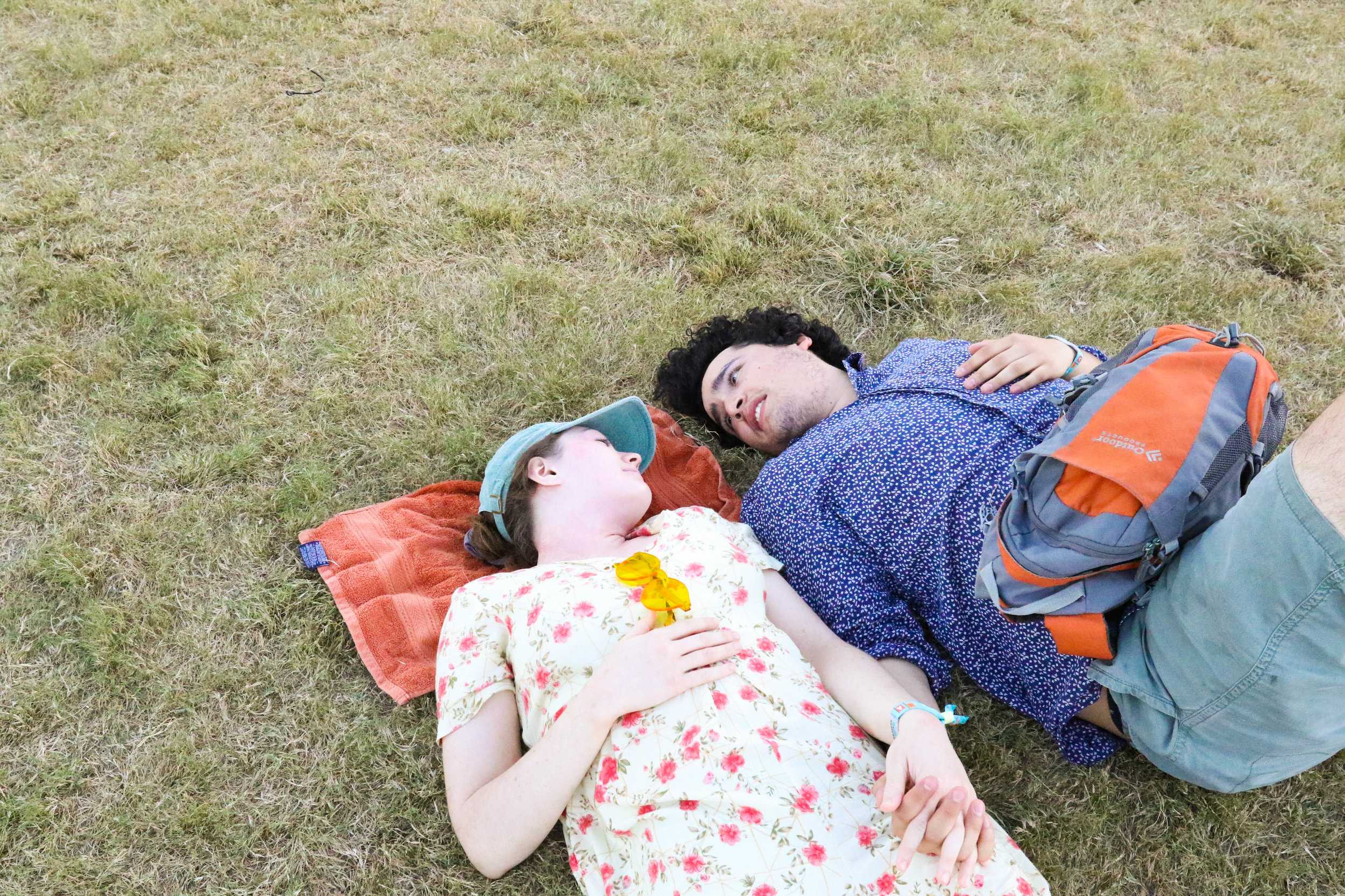   A couple shares a quiet moment in the ACL madness.  