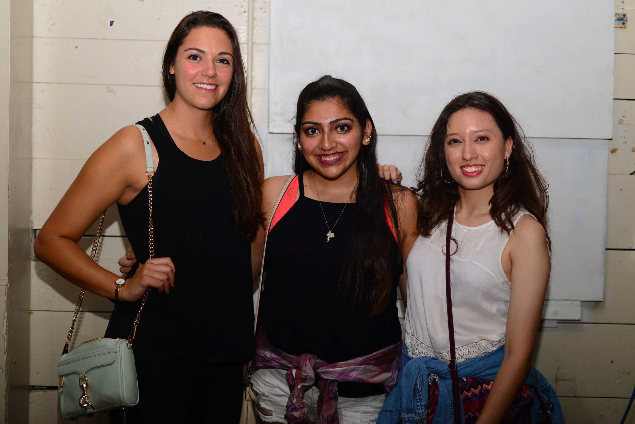   ORANGE editors Emma Whalen, Karla Pulido and Estephanie Gomez cheese for the camera. Photo by Dahlia Dandashi.  