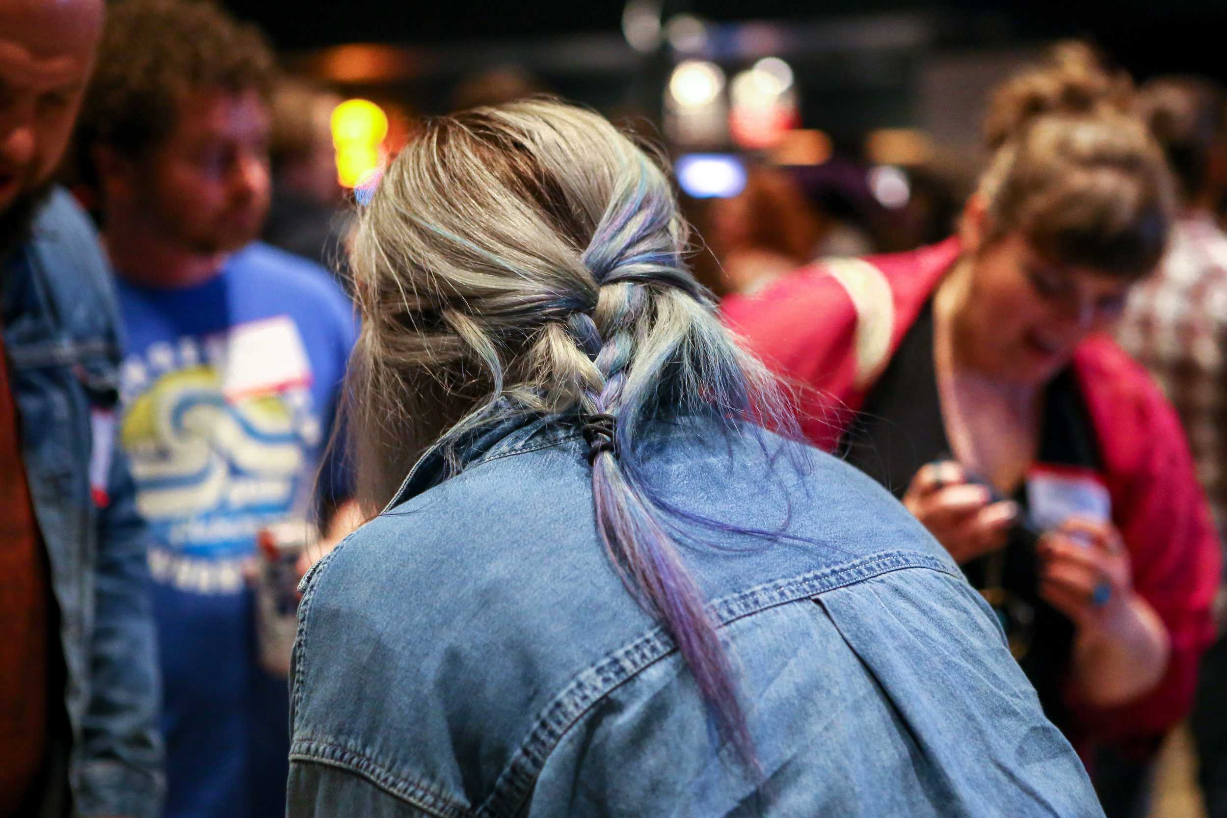   Expo attendees talks to various representatives from organizations that focus in supporting local Austin musicians.  