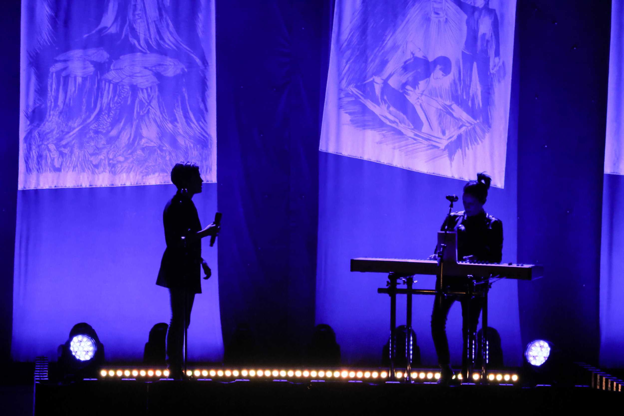   The colorful backlit stage created silhouettes of the artists during slower numbers.   