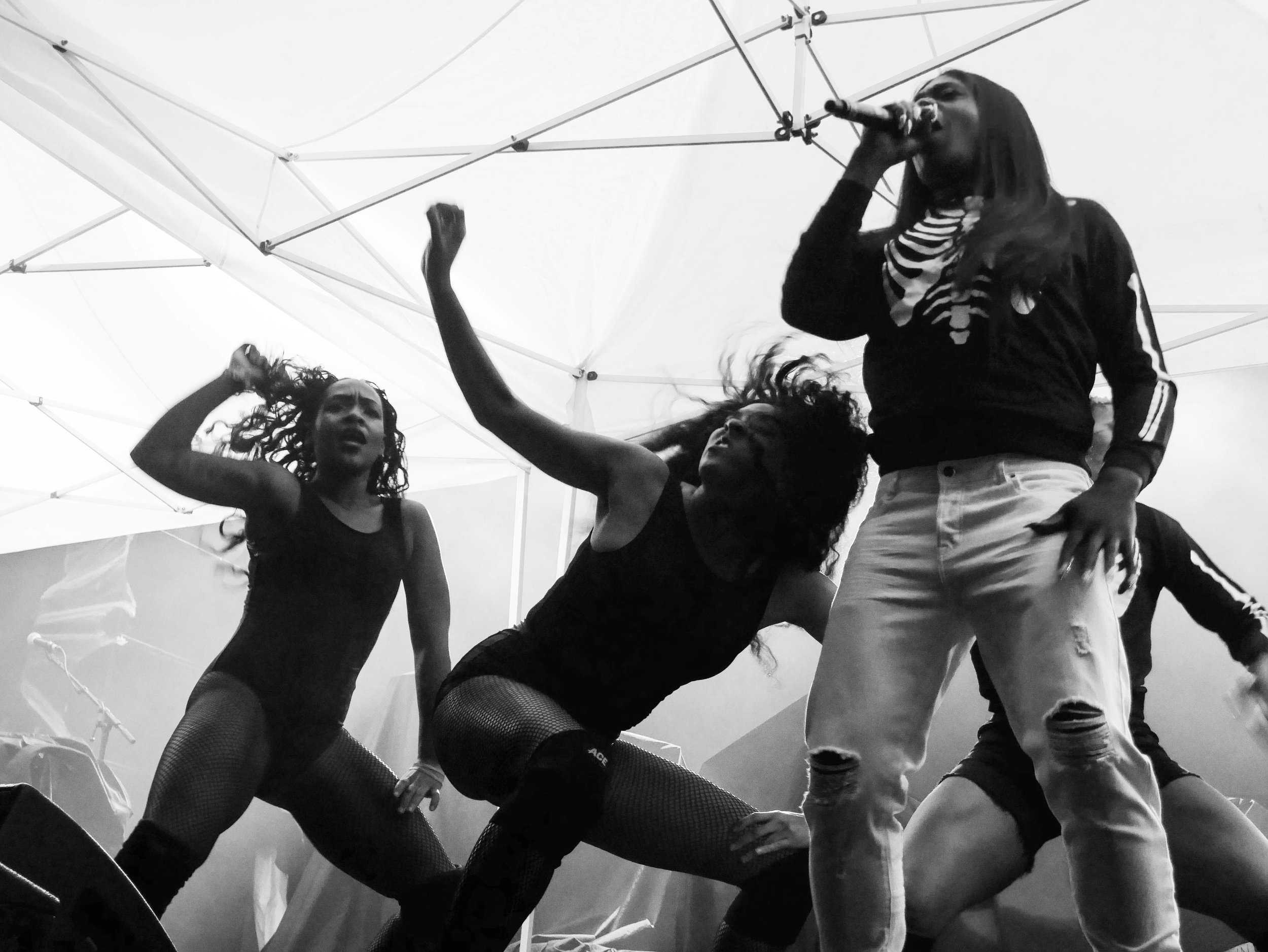   Big Freedia and his dance troupe, dressed as skeletons, open up for LCD Soundsystem.  