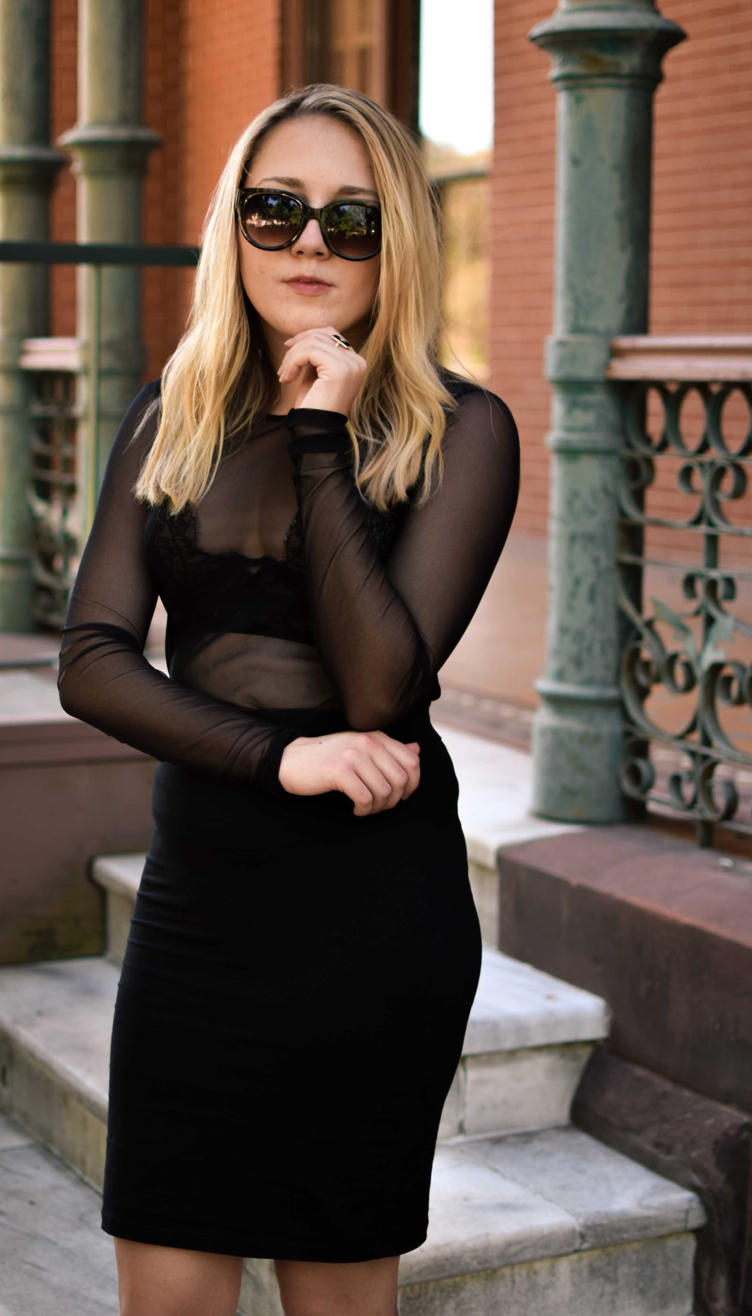   Long is styled in an all-black ensemble. Styled by Kristina Nguyen and Avery Long.  