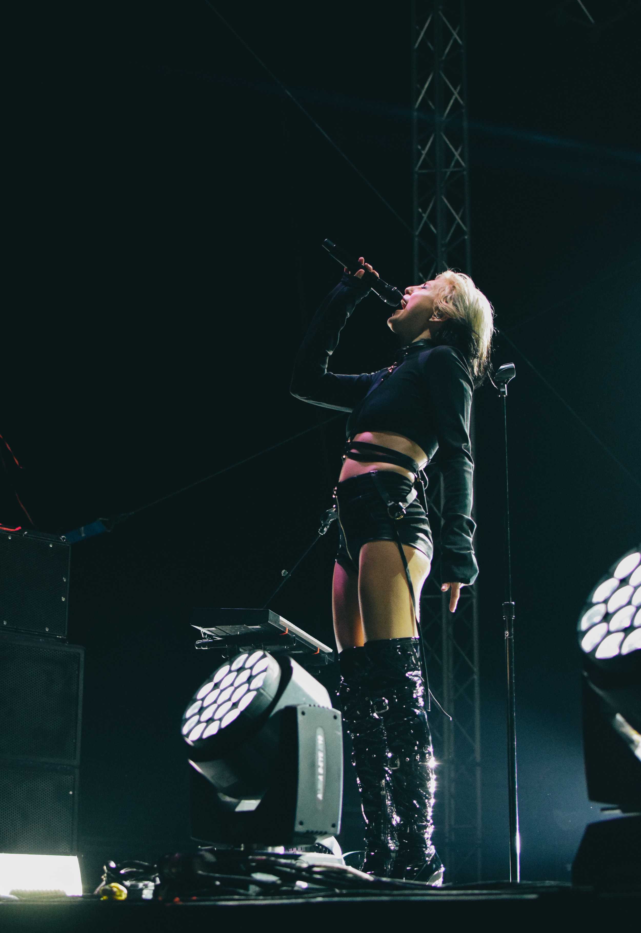   Sarah Barthel of Phantogram stuns the crowd with her vocals and daring outfit.  