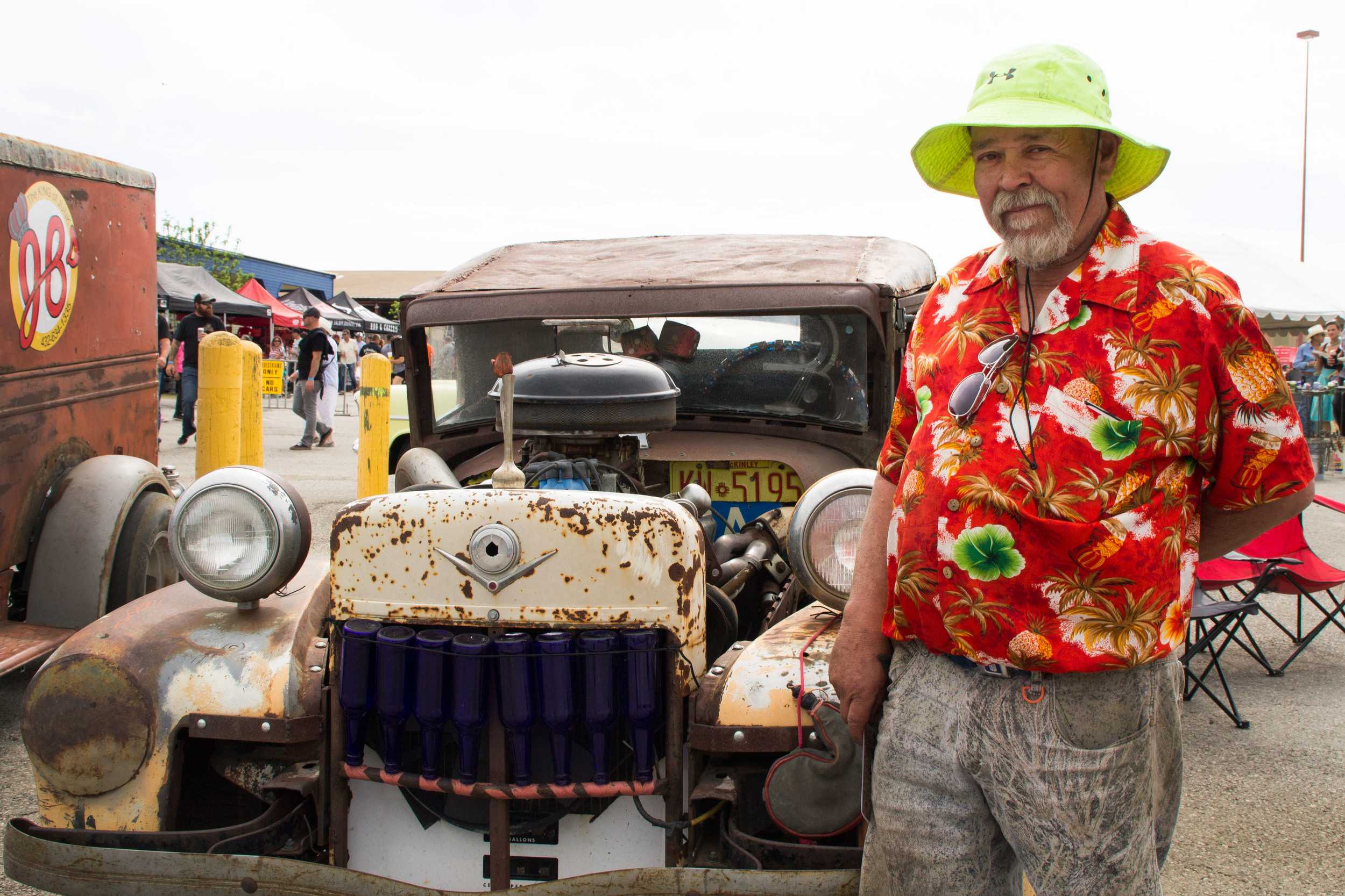  Tixier poses next to “Rat City,” a car he built from scraps in a junkyard. Amazingly, Tixier says that “every part came from the ground.” The car is being sold for $17,000 as a customized vehicle, but Tixier reveals that it cost him just $11 to buil