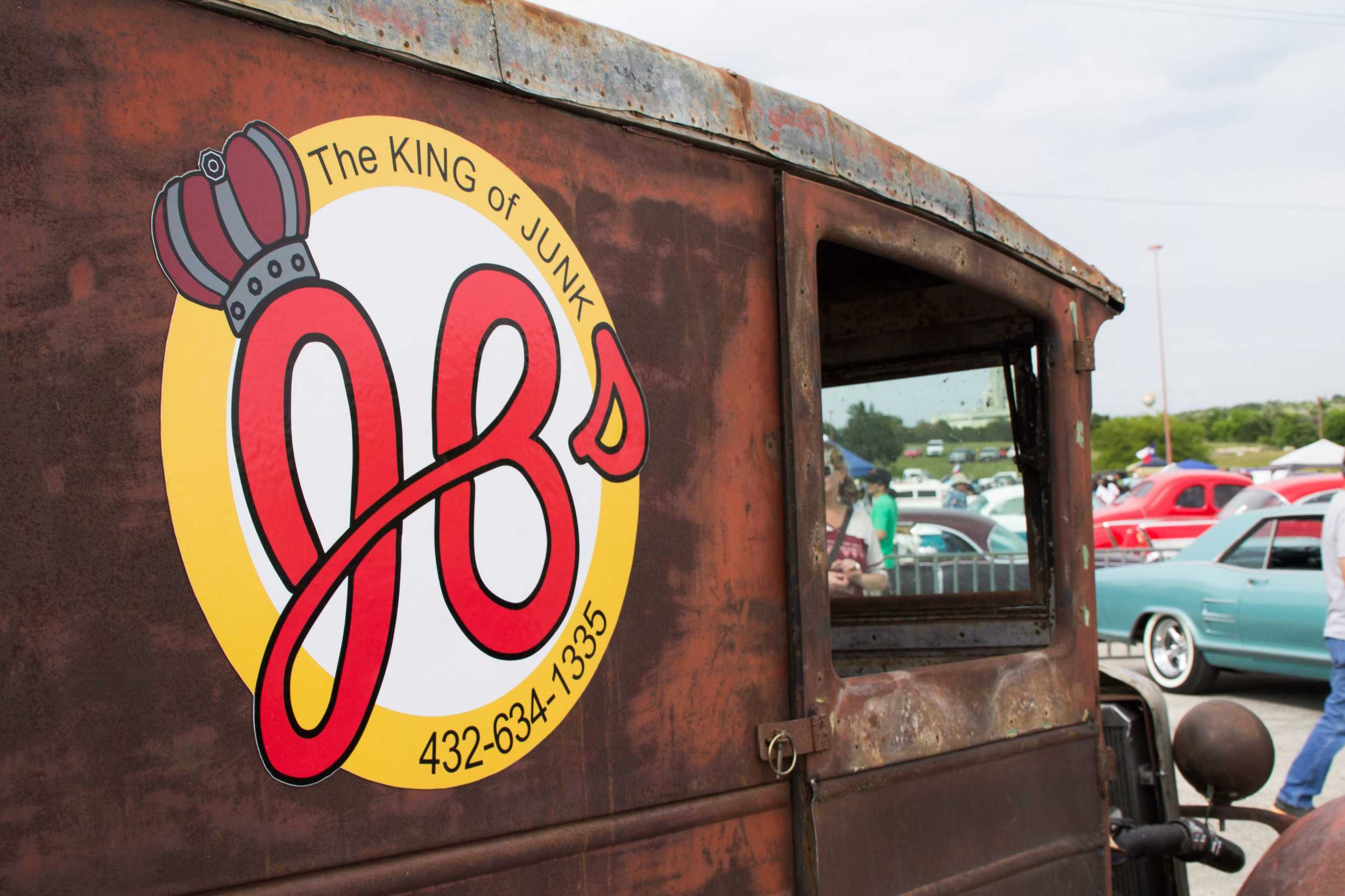  “The King of Junk:” JB Kingston’s car decal plays on his last name, loudly advertising for his junk-hauling business. 