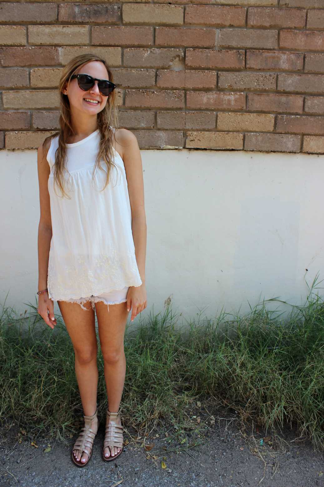  5-foot-2-inch journalism and public relations sophomore Alison Elberger wears solid colors with a flowy top and cut-off shorts.  Photograph by Miranda Chiechi  