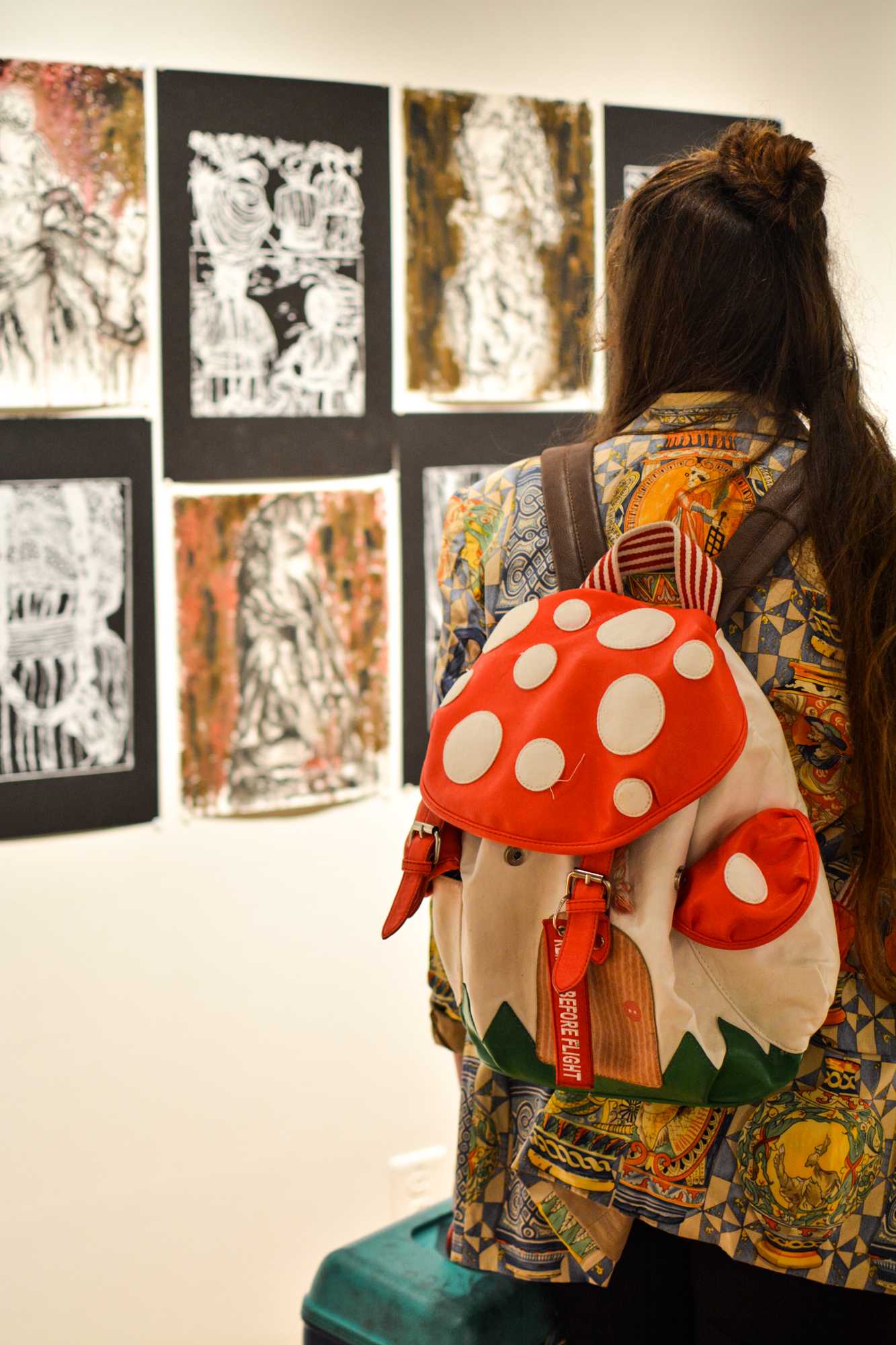   Visitors attended the Study Abroad Art Show in the Visual Art Center.  