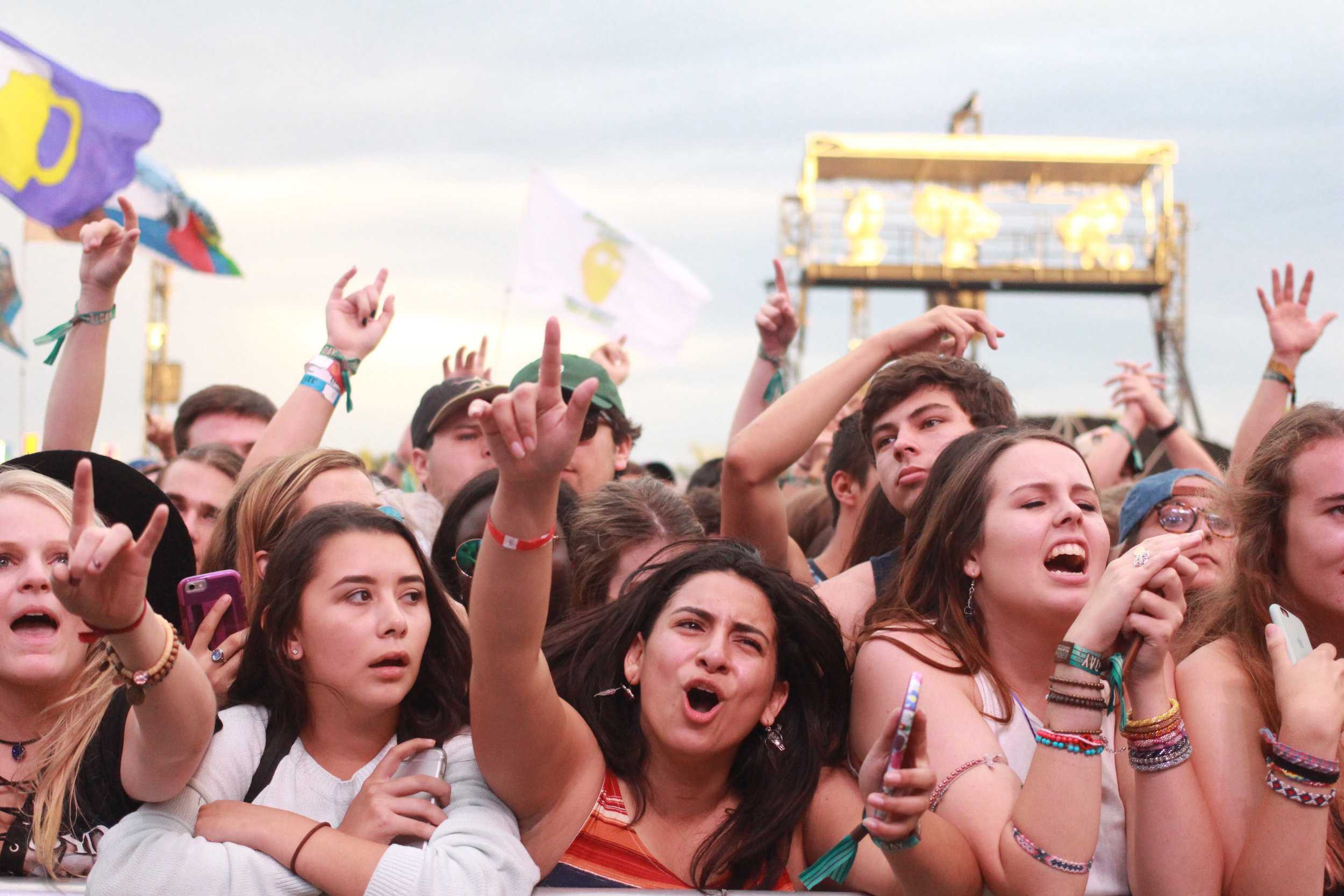   The crowd sings along to the lyrics.  