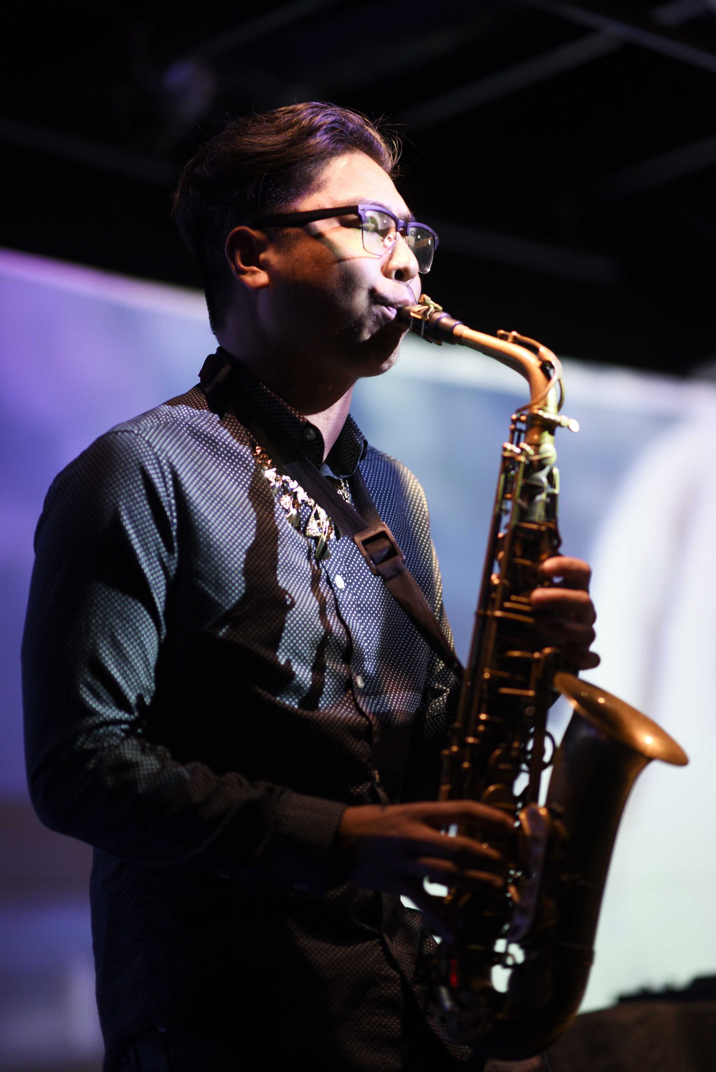   A saxophone player accompanied Kyleeil during his set.  