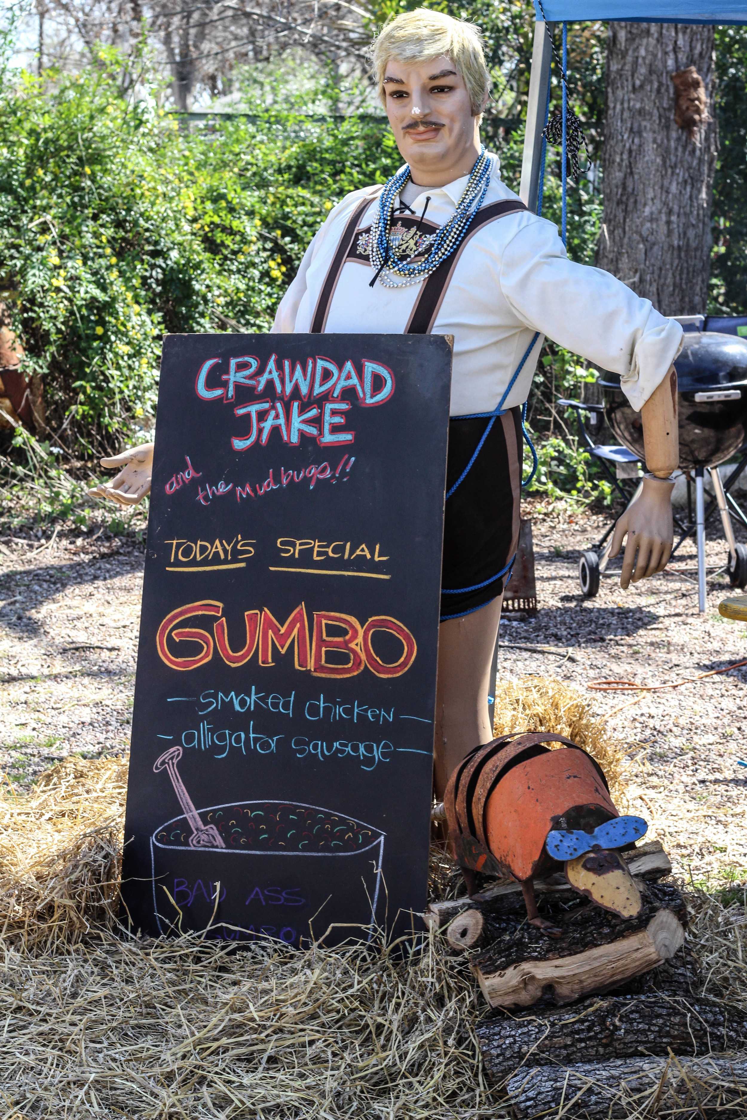   Crawdad Jake does his best to attract people to his gumbo.  