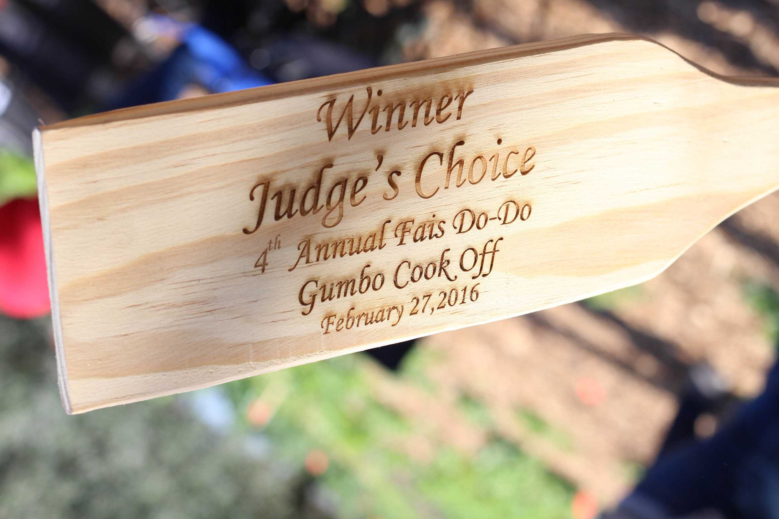   Tried and Troux takes home the judge's choice wooden spatula for the 4th Annual Fais Do-Do Gumbo Cook Off.  