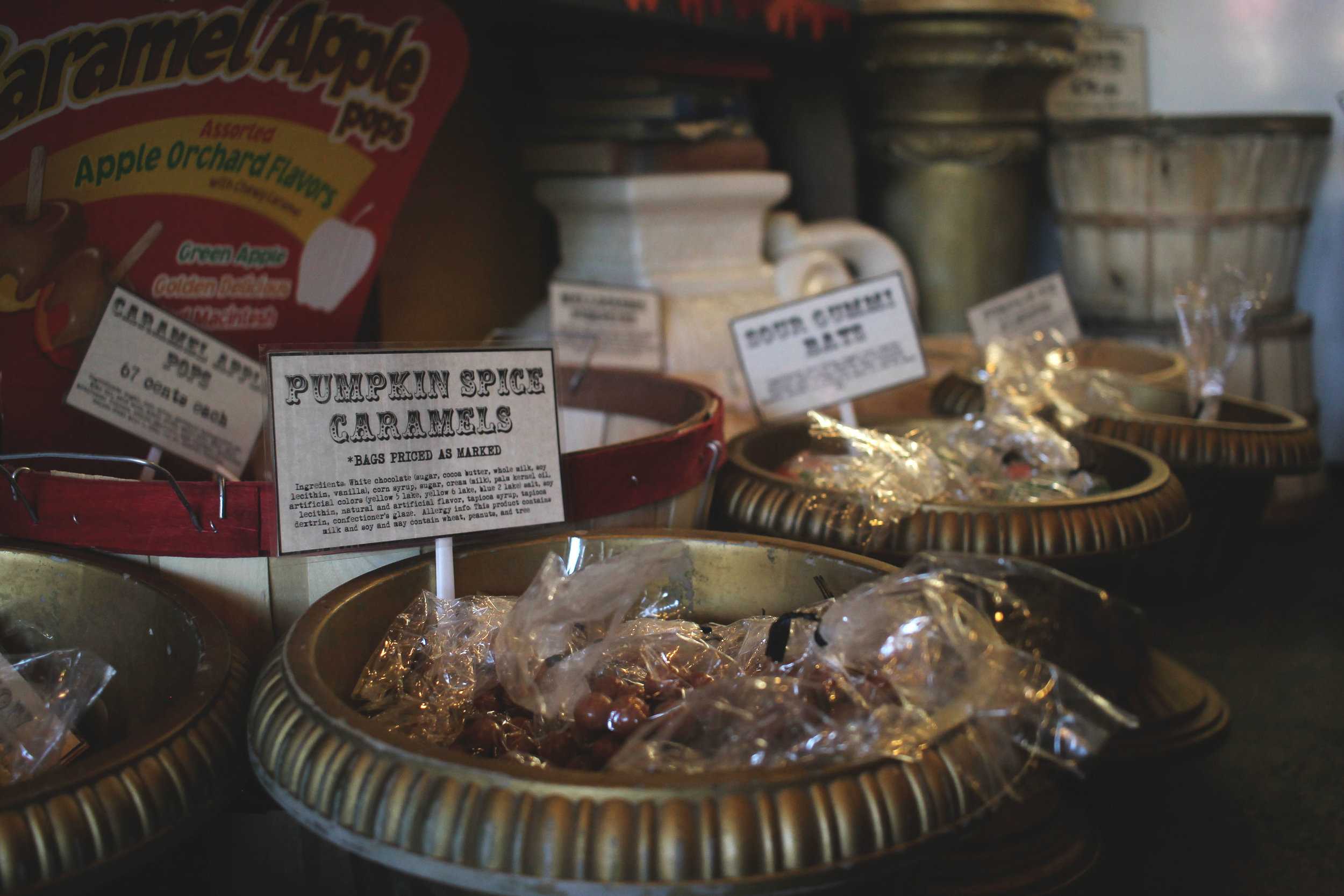  Th e halloween candy in the baskets vary from candy corn to these pumpkin spice caramels.  