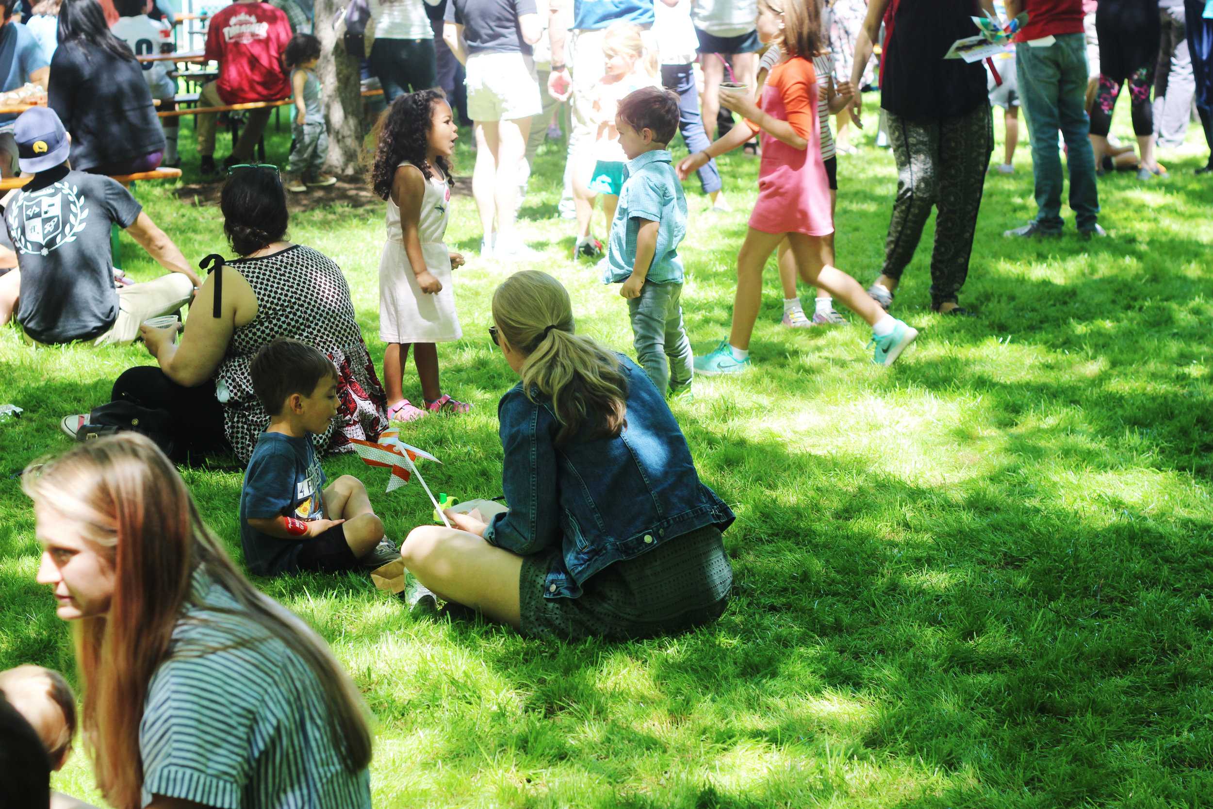   Outside of the museum at the Blanton Block Party, people enjoy food truck tacos, live music and warm weather.  