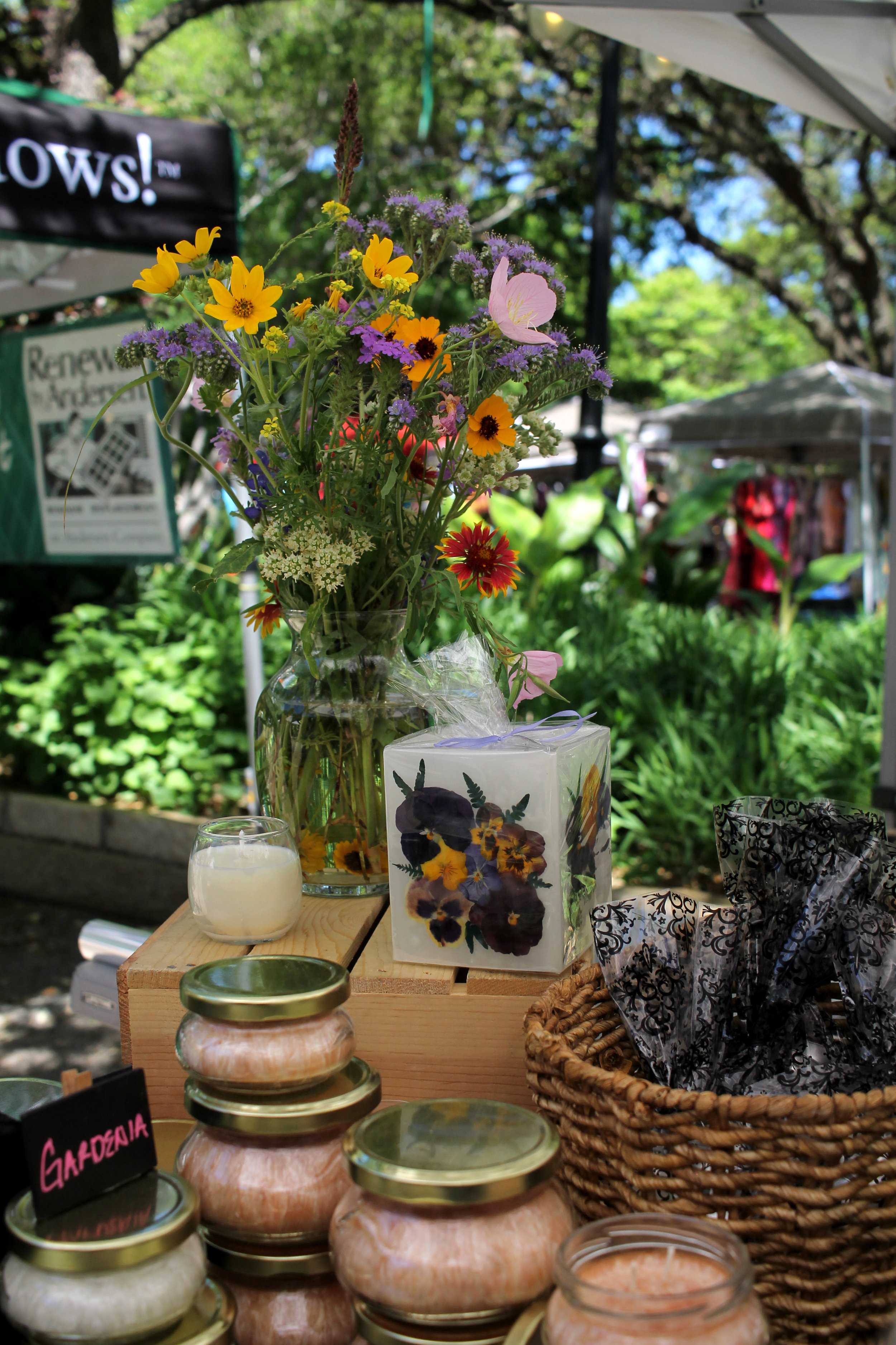   The Bee Curious Candles are pressed with flowers that the designers grow themselves.  