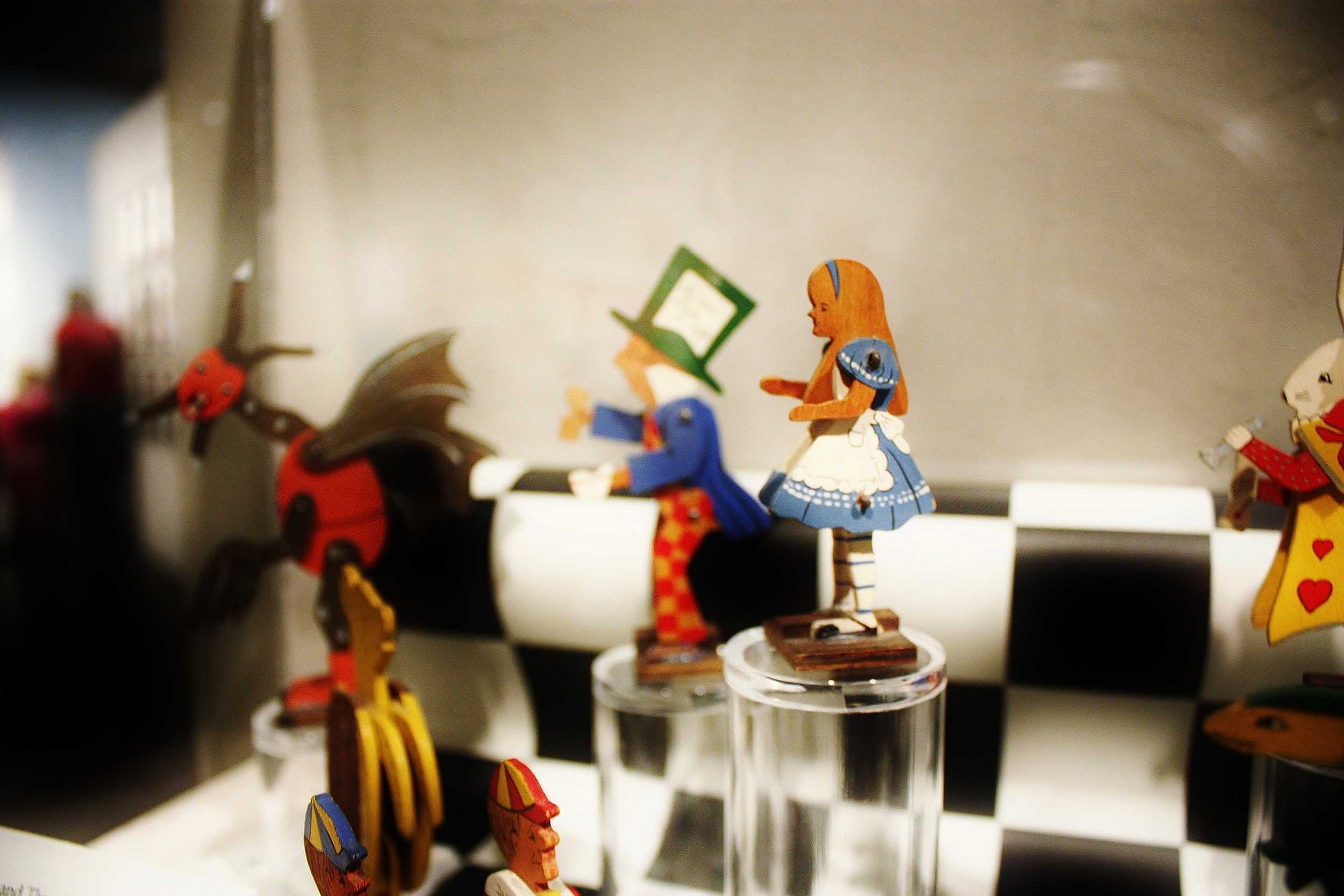  “Alice’s Adventures in Wonderland” and “Through the Looking Glass” wooden figurines. 