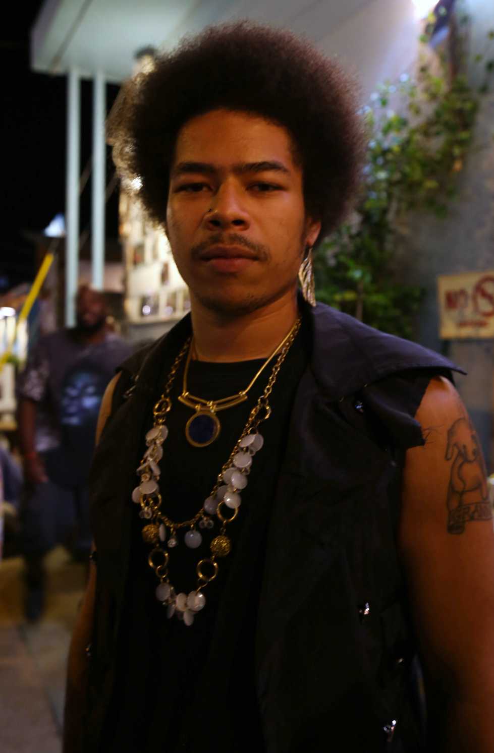  Rapper Deaven Bean, also known as “Philos," stands outside Spider House Ballroom before his performance on a Tuesday night. 