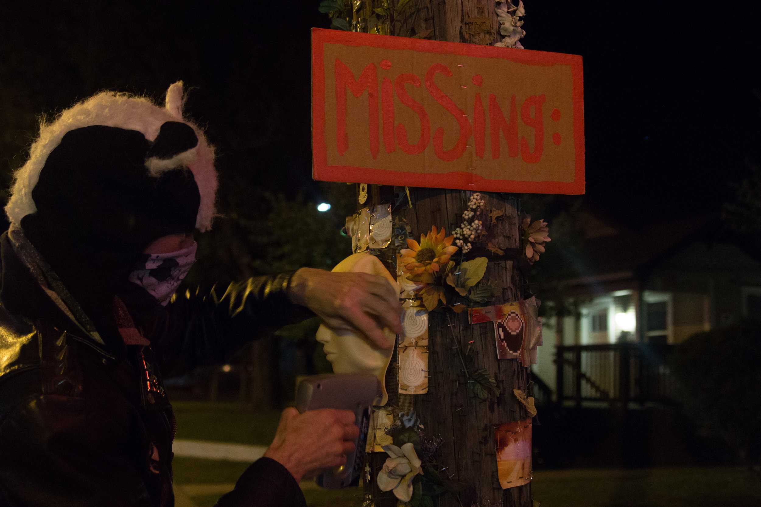   The “missing” sign on this poll was added to RabbitSnake’s sculpture by an unknown artist. “[Art] is a collaborative thing, which I encourage,” RabbitSnake says. “Ultimately I’d like to see more people decorate the poles of their neighborhoods.”  