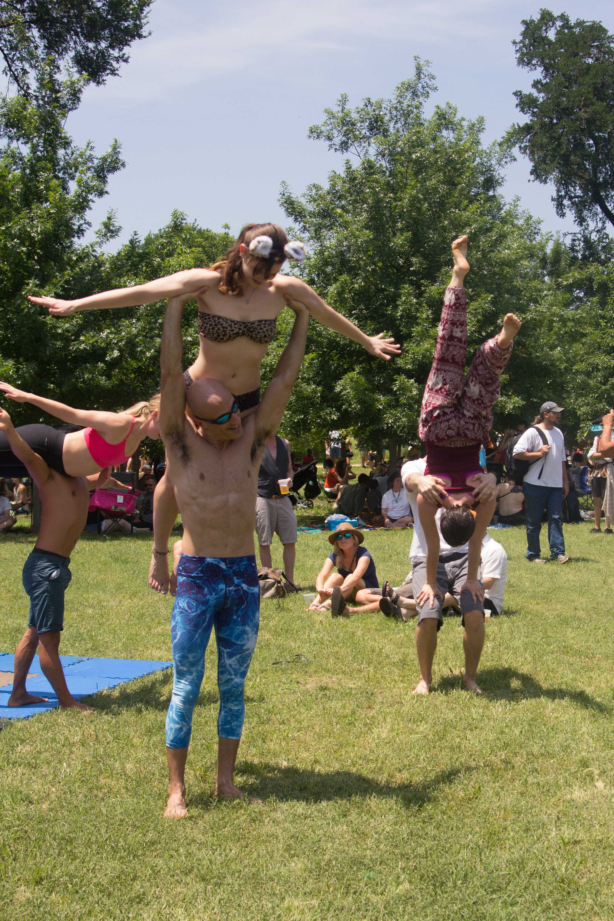   Participants in an acro-yoga demonstration.     