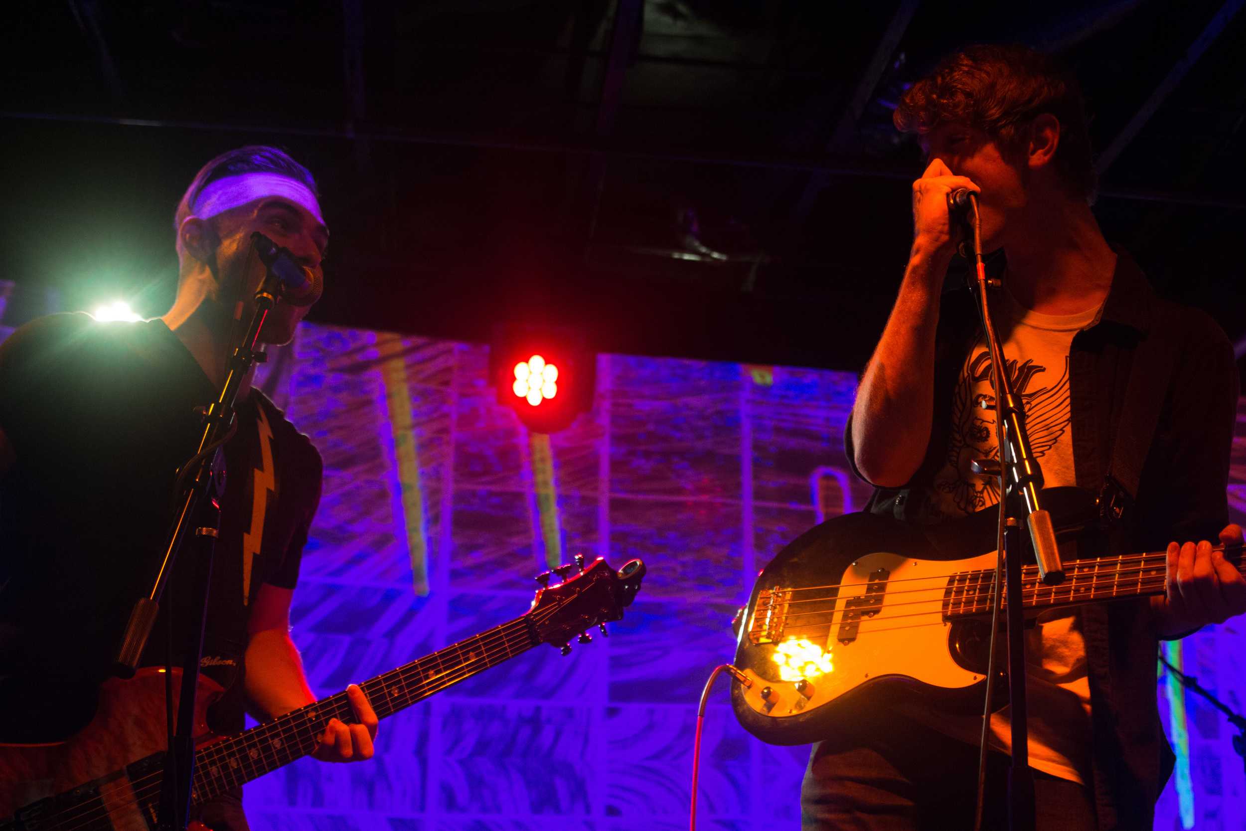   Jim Hampton and Bryan Rolli of Boys Club sharing a moment on stage during their final song. Photo by Kristin Evans.  