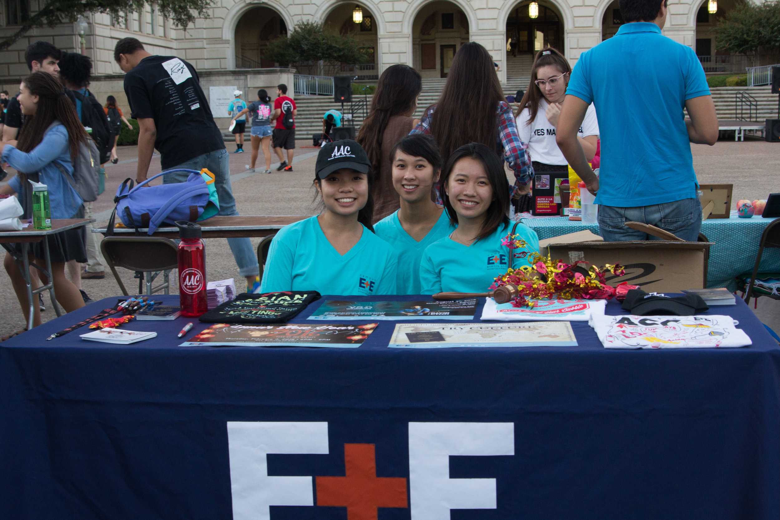   Campus E + E members Tam Do, Jasmine Yang and Jenna Ma welcomed students to the event.  