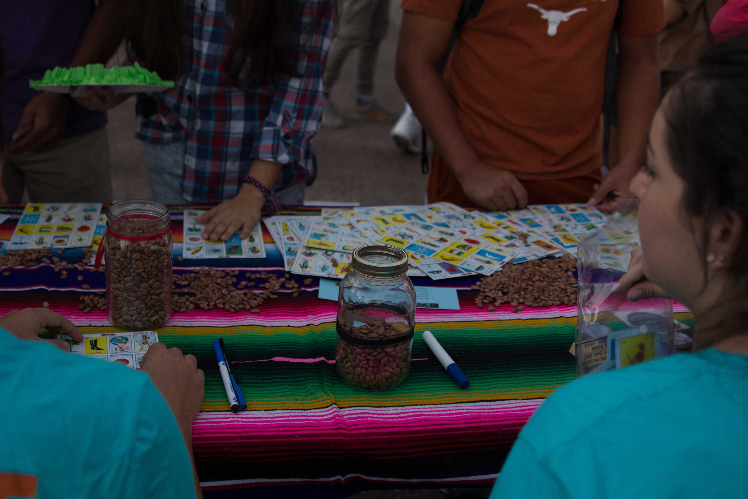   Lotería, similar to bingo, is played by matching images from a deck of cards.  