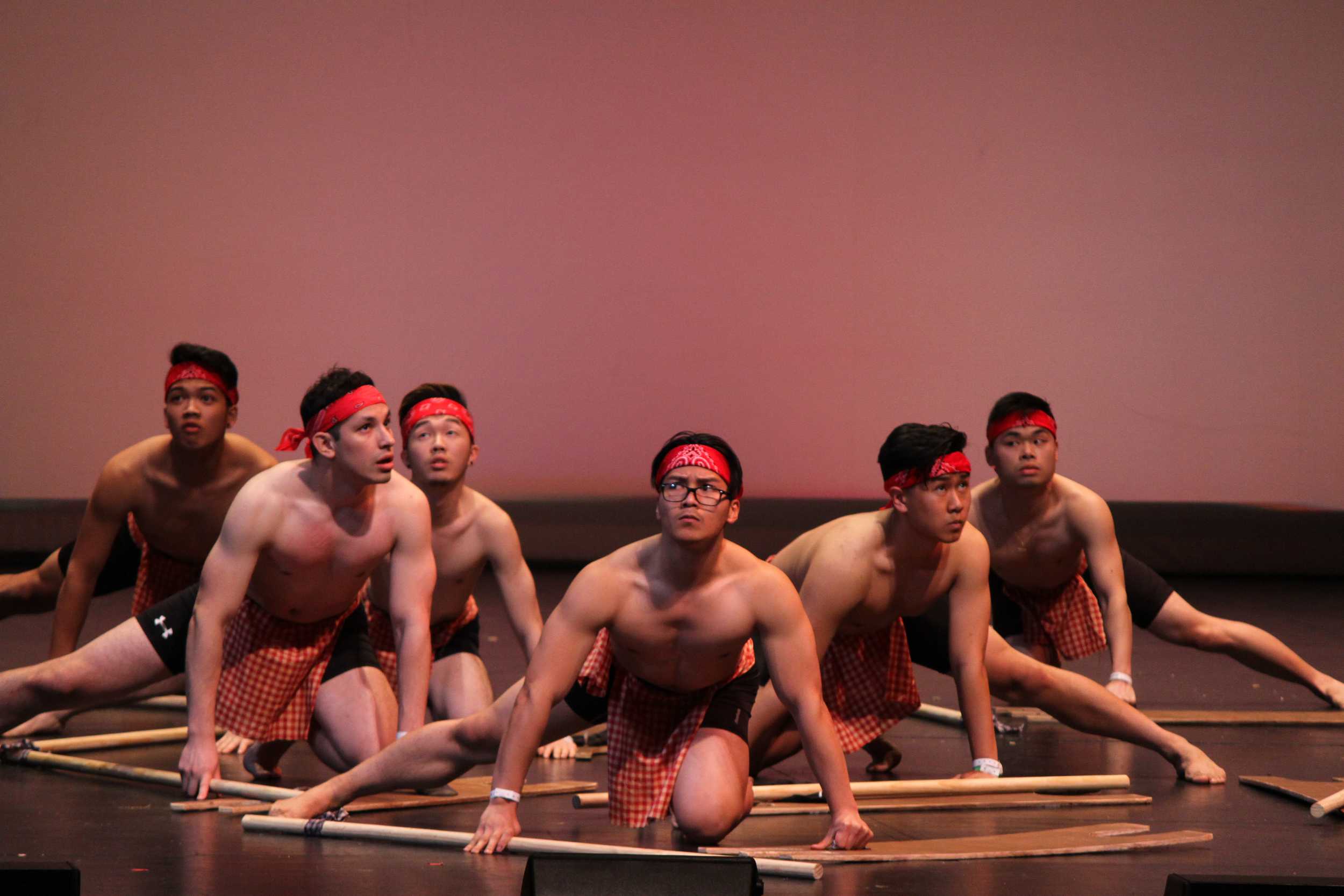  Members of UT Arlington's cultural dance team acted as warriors in their performance of the traditional dance called "Idaw." 