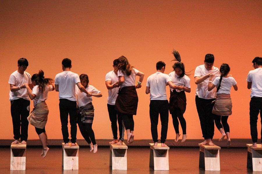  UT's cultural team performed the dance "Sayaw sa Bangko" in which benches are stacked high and the women hop up and down from the different heights. 