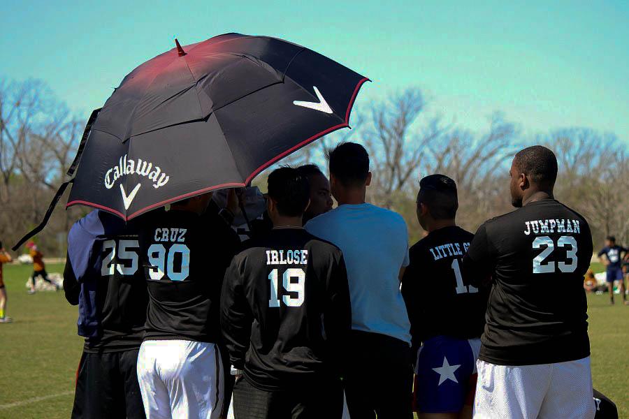  Houston Baptist University students tried to shield themselves from the hot sun while spectating some of the outdoor games at Goodphil. 