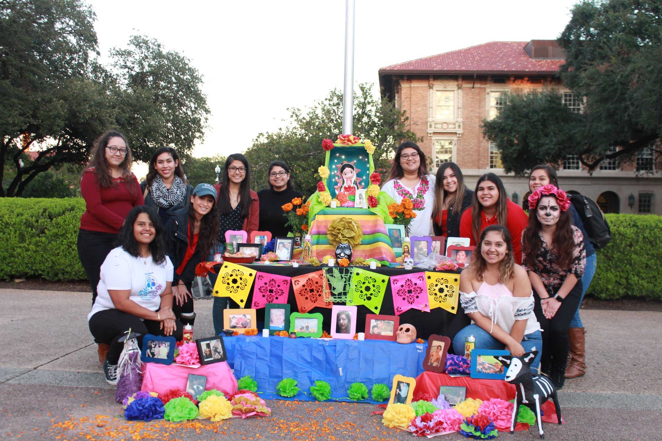  The women of Sigma Delta Lambda emphasize that their altar is more than just a theme. Rather, it shows a personal reflection inside each of their lives as they display those who have passed. 