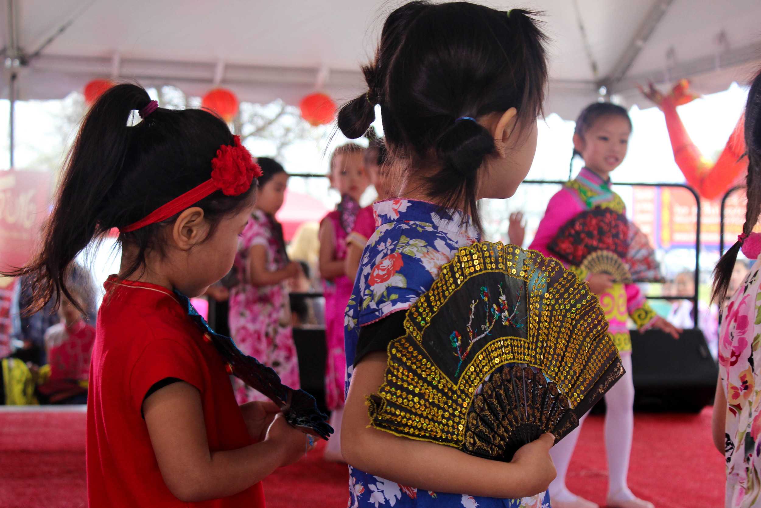  The young dancers from Love of China School of Dance gather together with their fans for the big finale. 