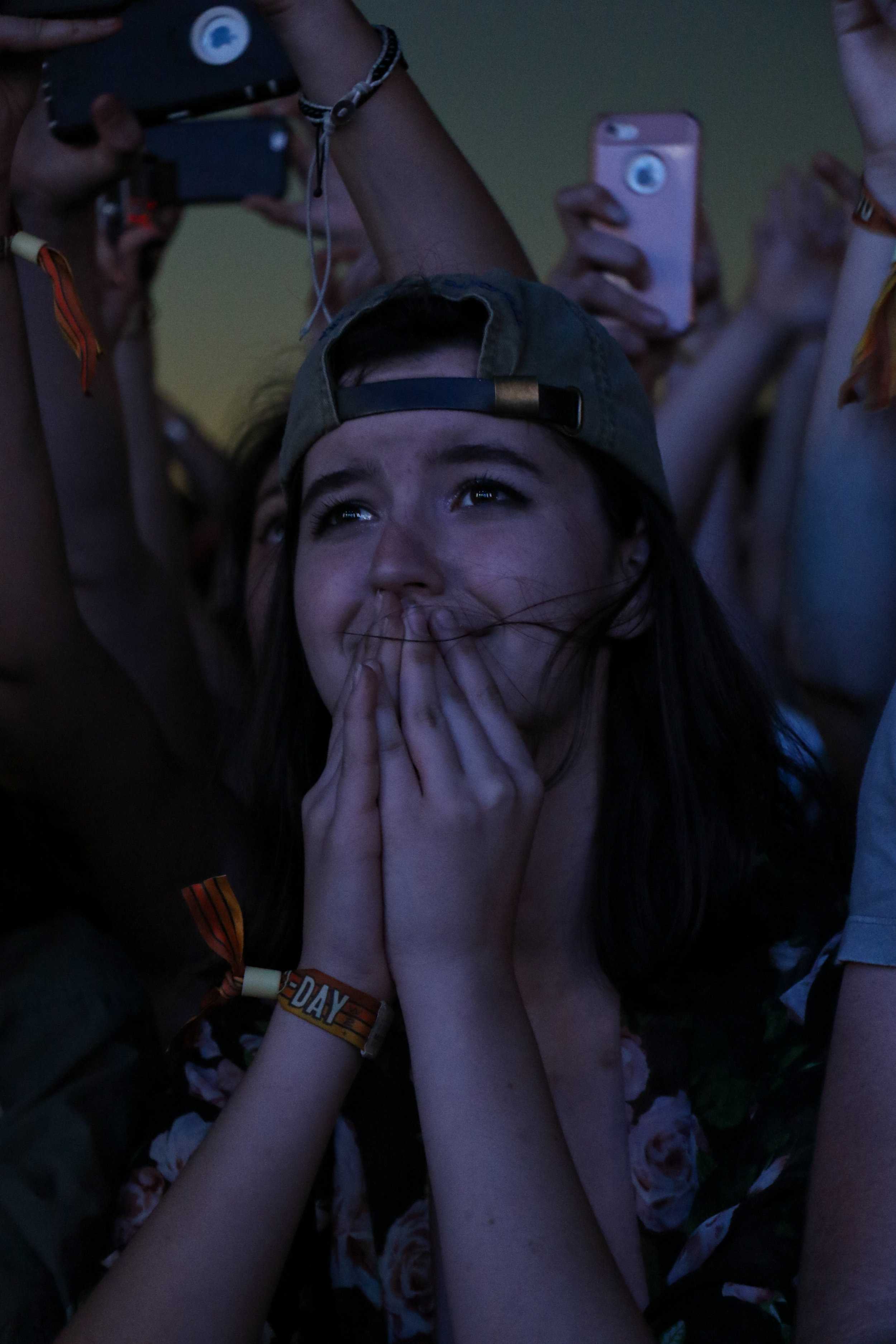   A fan is caught in an emotional moment during Two Door Cinema Club’s set.  